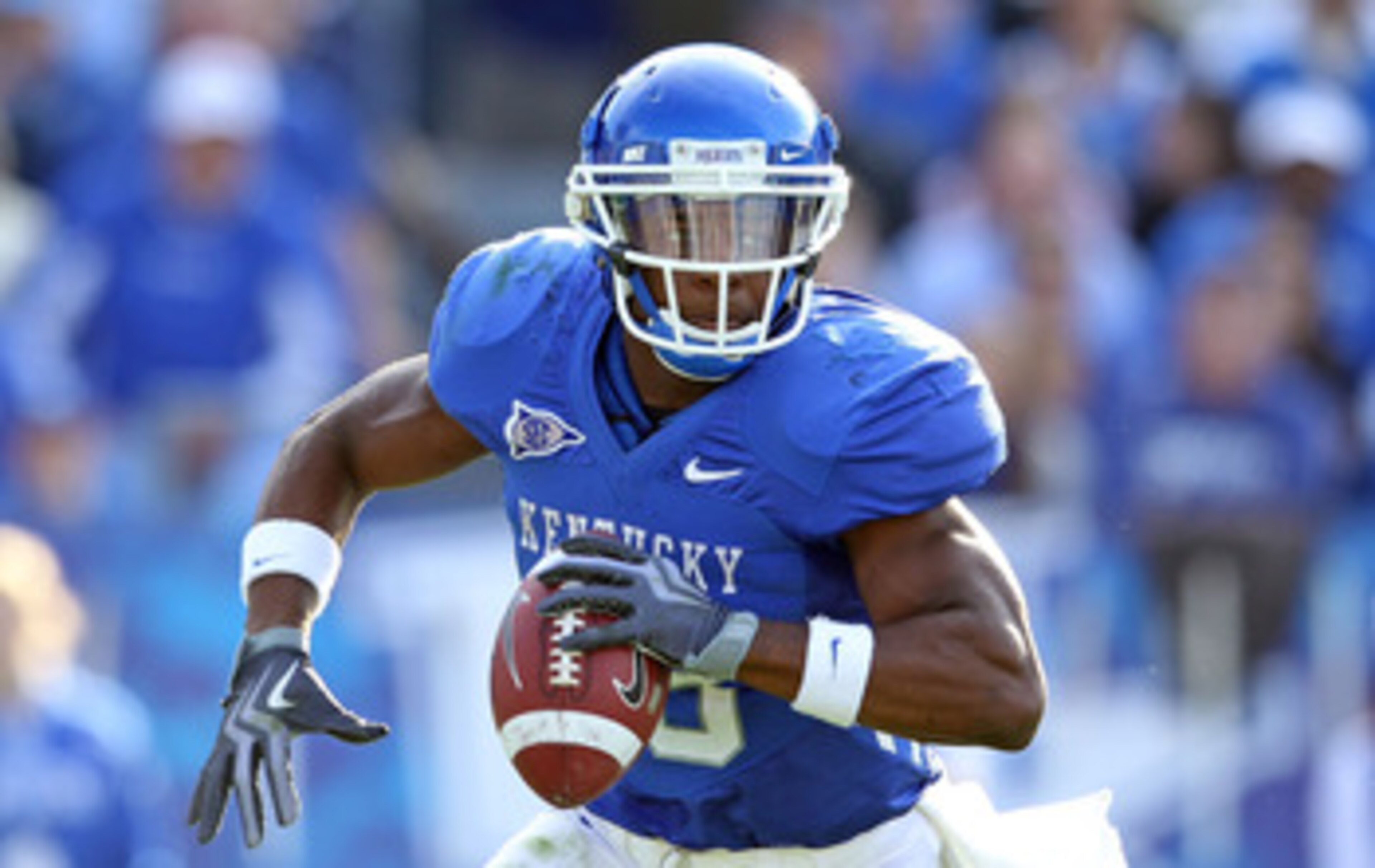 LEXINGTON, KY - NOVEMBER 13: Randall Cobb #18 of the Kentucky Wildcats runs with the ball during the game against the Vanderbilt Commodores at Commonwealth Stadium on November 13, 2010 in Lexington, Kentucky. Kentucky won 38-20. (Photo by Andy Lyons/Get LEXINGTON, KY - NOVEMBER 13: Randall Cobb #18 of the Kentucky Wildcats runs with the ball during the game against the Vanderbilt Commodores at Commonwealth Stadium on November 13, 2010 in Lexington, Kentucky. Kentucky won 38-20. (Photo by Andy Lyons/Get