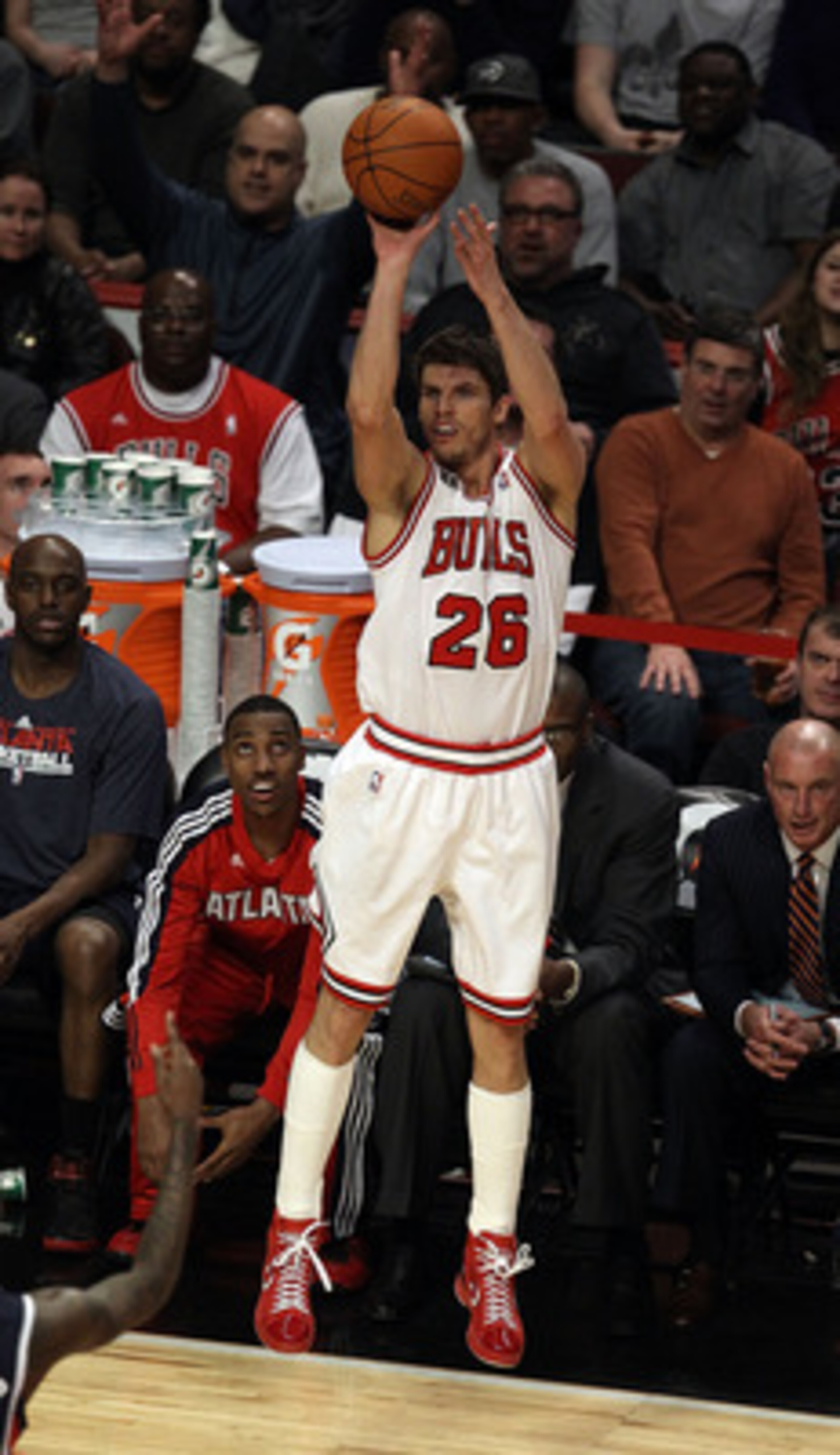 CHICAGO, IL - MARCH 11: Kyle Korver #26 of the Chicago Bulls shoots a three-point shot against the Atlanta Hawks at the United Center on March 11, 2011 in Chicago, Illinois. The Bulls defeated the Hawks 94-76. NOTE TO USER: User expressly acknowledges and CHICAGO, IL - MARCH 11: Kyle Korver #26 of the Chicago Bulls shoots a three-point shot against the Atlanta Hawks at the United Center on March 11, 2011 in Chicago, Illinois. The Bulls defeated the Hawks 94-76. NOTE TO USER: User expressly acknowledges and
