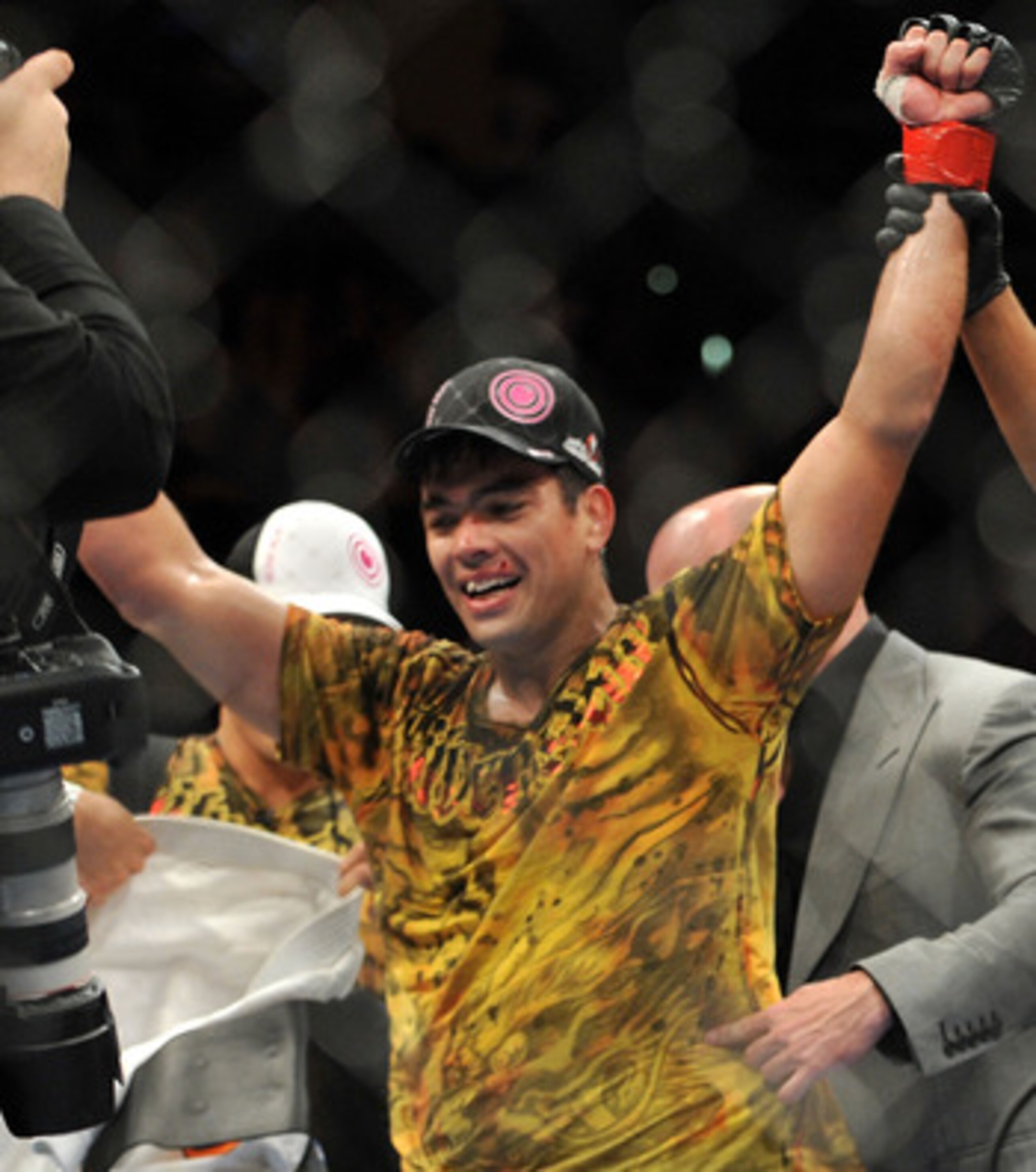 LOS ANGELES, CA - OCTOBER 24:  UFC Light Heavyweight Champion Lyoto Machida celebrates his victory over UFC Light Heavyweight challenger Mauricio Rua (not pictured) in their title fight at UFC 104 at Staples Center on October 24, 2009 in Los Angeles, Cali