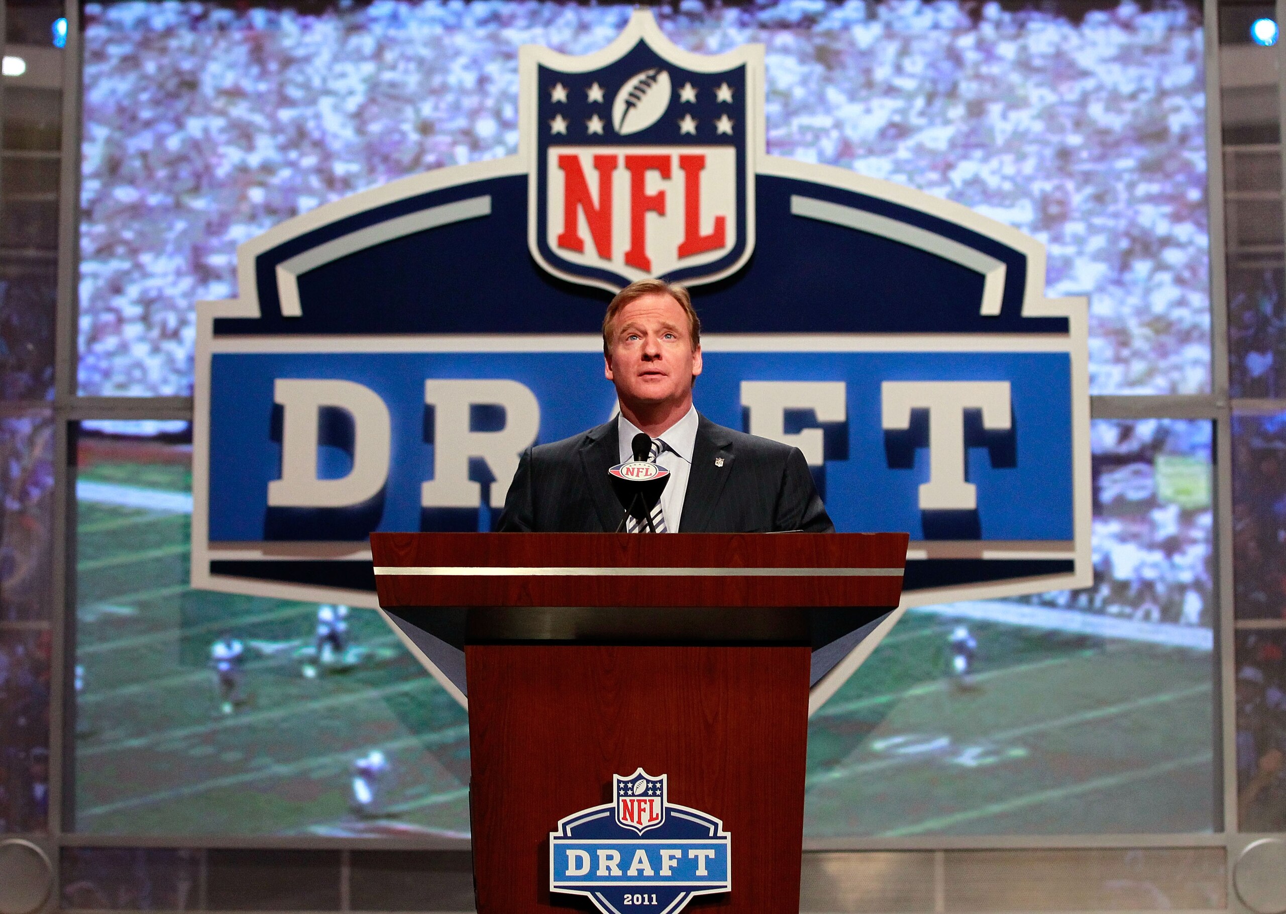 NEW YORK, NY - APRIL 28: NFL Commissioner Roger Goodell speaks at the podium during the 2011 NFL Draft at Radio City Music Hall on April 28, 2011 in New York City. (Photo by Chris Trotman/Getty Images) NEW YORK, NY - APRIL 28: NFL Commissioner Roger Goodell speaks at the podium during the 2011 NFL Draft at Radio City Music Hall on April 28, 2011 in New York City. (Photo by Chris Trotman/Getty Images)