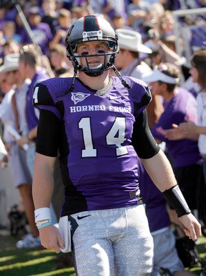 FORT WORTH, TX - OCTOBER 16:  Quarterback Andy Dalton #14 of the Texas Christian University Horned Frogs walks on the field against the Brigham Young University Cougars at Amon G. Carter Stadium on October 16, 2010 in Fort Worth, Texas.  (Photo by Tom Pen