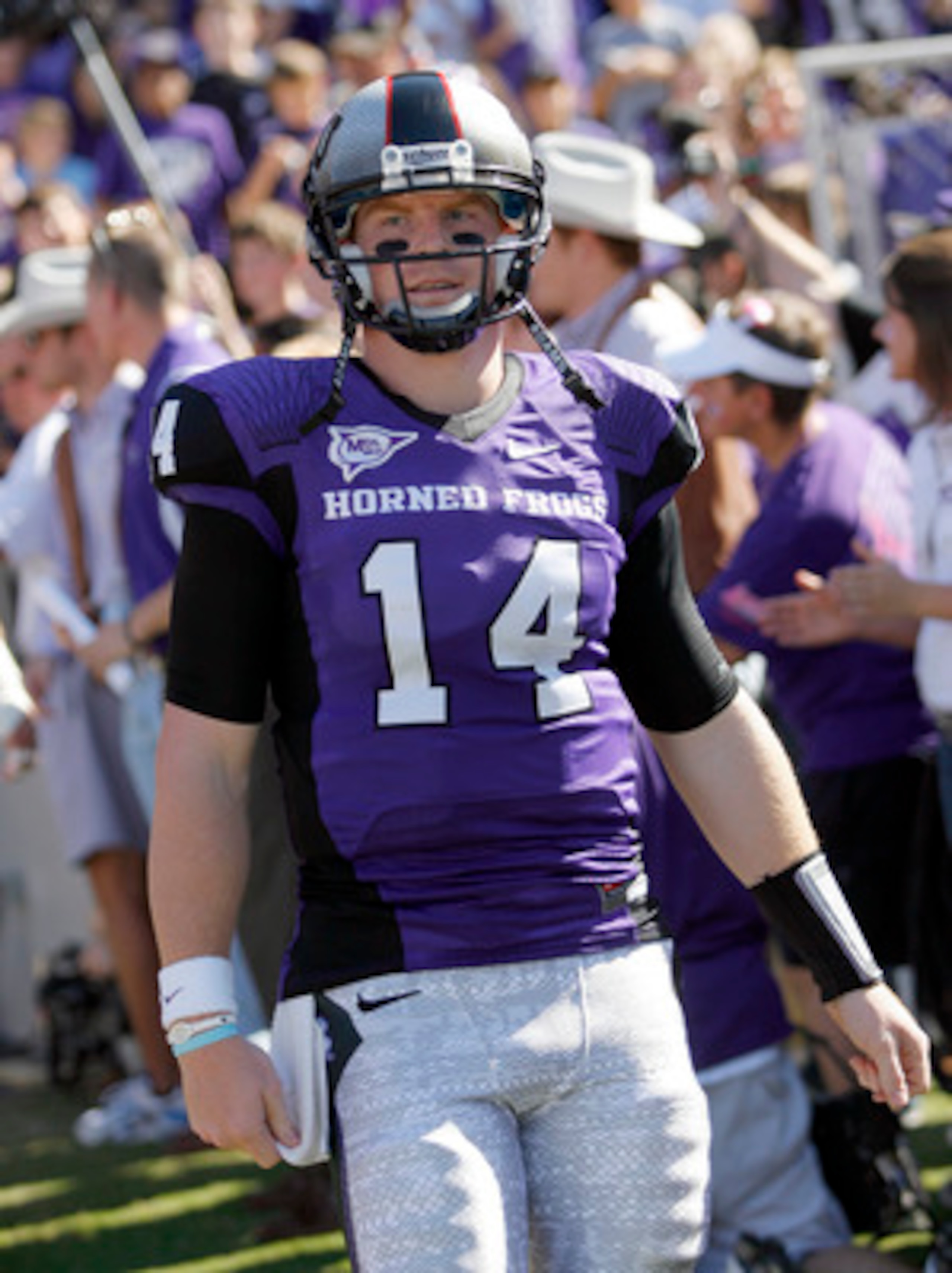 FORT WORTH, TX - OCTOBER 16: Quarterback Andy Dalton #14 of the Texas Christian University Horned Frogs walks on the field against the Brigham Young University Cougars at Amon G. Carter Stadium on October 16, 2010 in Fort Worth, Texas. (Photo by Tom Pen FORT WORTH, TX - OCTOBER 16: Quarterback Andy Dalton #14 of the Texas Christian University Horned Frogs walks on the field against the Brigham Young University Cougars at Amon G. Carter Stadium on October 16, 2010 in Fort Worth, Texas. (Photo by Tom Pen