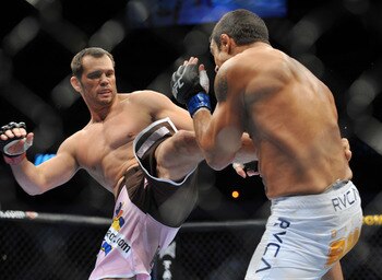 DALLAS - SEPTEMBER 19: UFC fighter Vitor Belfort (R) battles UFC fighter Rich Franklin (L) during their Catch weight bout at UFC 103: Franklin vs. Belfort at the American Airlines Center on September 19, 2009 in Dallas, Texas. (Photo by Jon Kopaloff/Get DALLAS - SEPTEMBER 19: UFC fighter Vitor Belfort (R) battles UFC fighter Rich Franklin (L) during their Catch weight bout at UFC 103: Franklin vs. Belfort at the American Airlines Center on September 19, 2009 in Dallas, Texas. (Photo by Jon Kopaloff/Get
