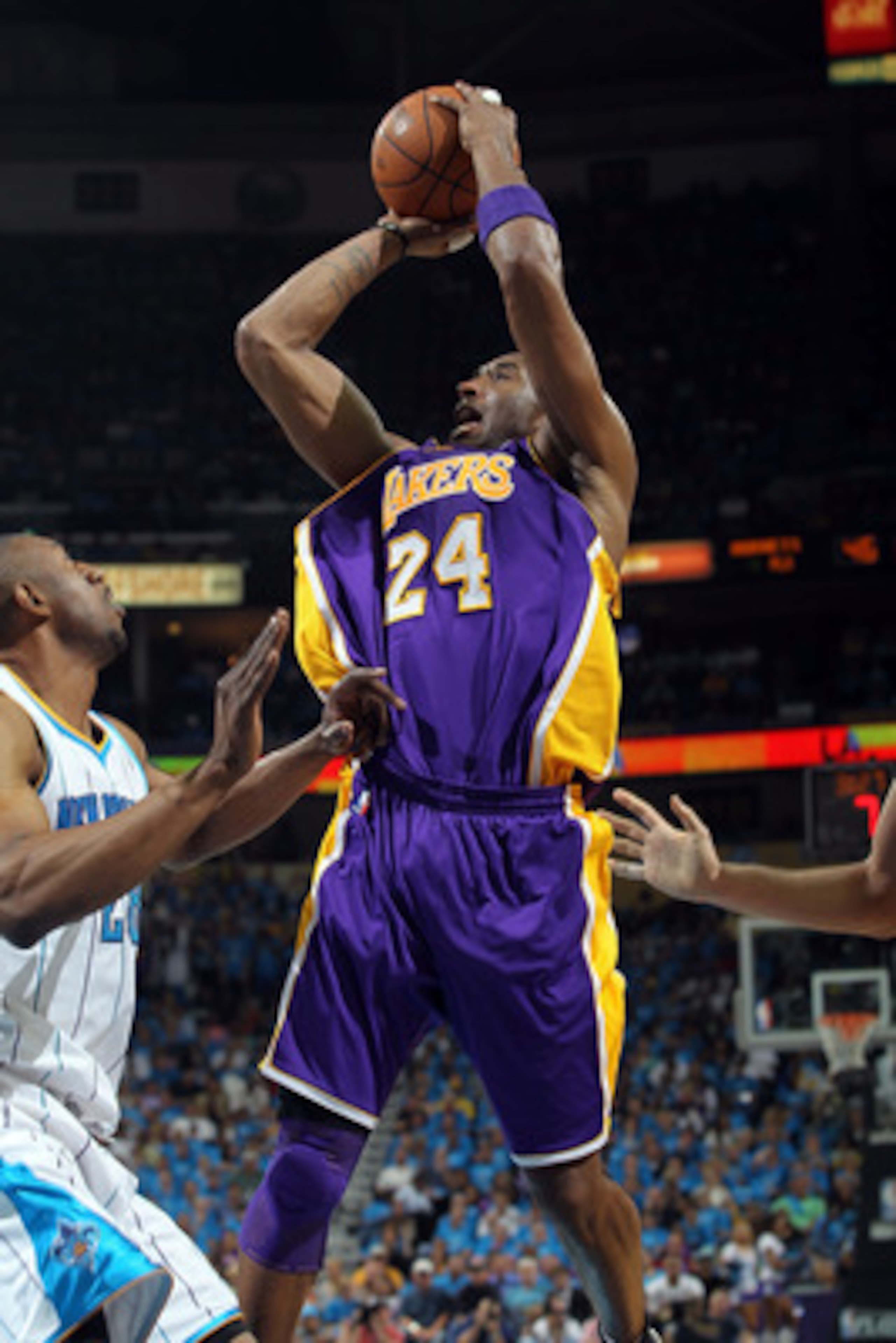 NEW ORLEANS, LA - APRIL 28:  Guard Kobe Bryant #24 of the Los Angeles Lakers takes a shot against D.J. Mbenga #28 of the New Orleans Hornets in Game Six of the Western Conference Quarterfinals in the 2011 NBA Playoffs on April 28, 2011 at New Orleans Aren