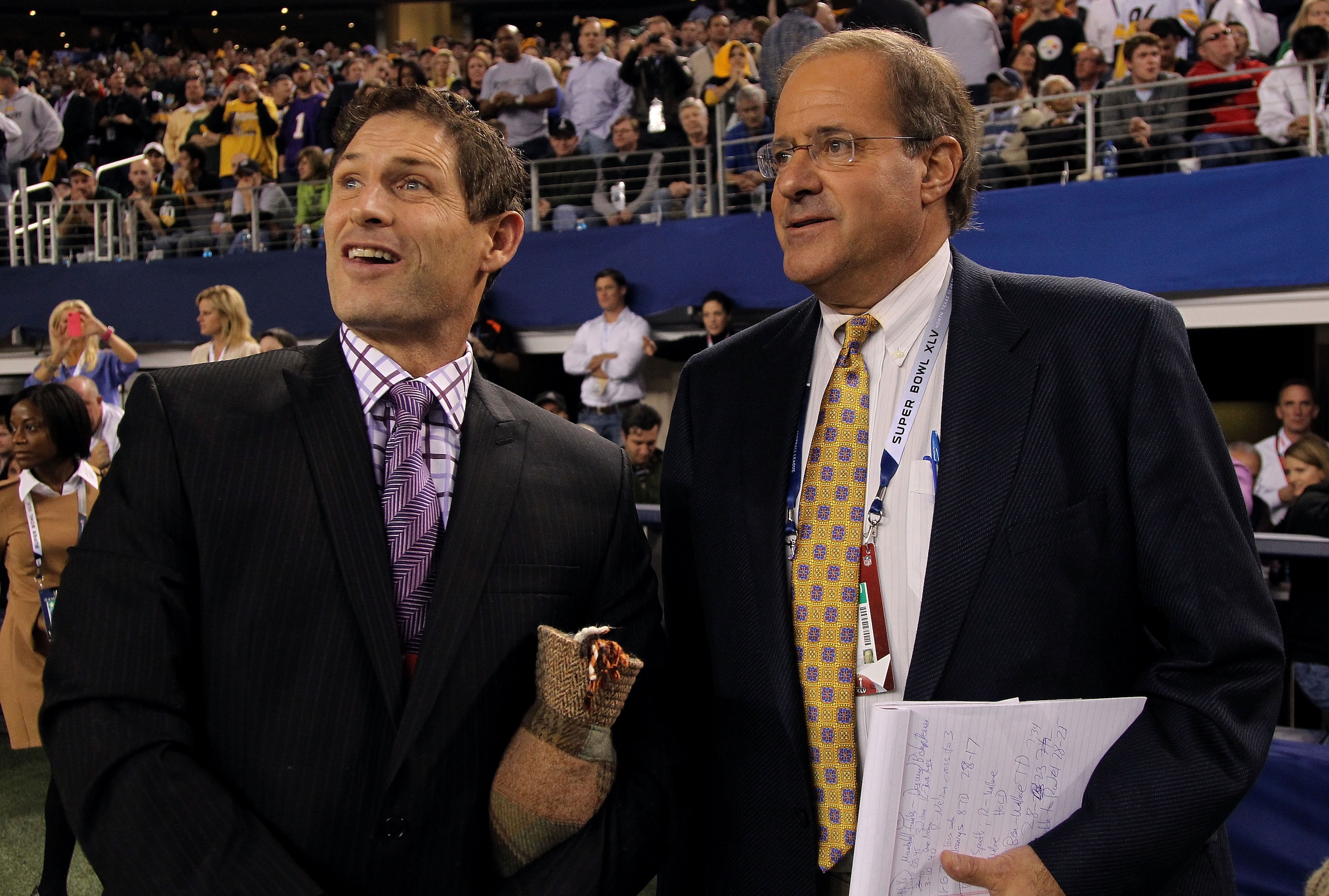 ARLINGTON, TX - FEBRUARY 06: ESPN TV personalities Steve Young and Chris Berman on the field during Super Bowl XLV at Cowboys Stadium on February 6, 2011 in Arlington, Texas. (Photo by Doug Pensinger/Getty Images) ARLINGTON, TX - FEBRUARY 06: ESPN TV personalities Steve Young and Chris Berman on the field during Super Bowl XLV at Cowboys Stadium on February 6, 2011 in Arlington, Texas. (Photo by Doug Pensinger/Getty Images)