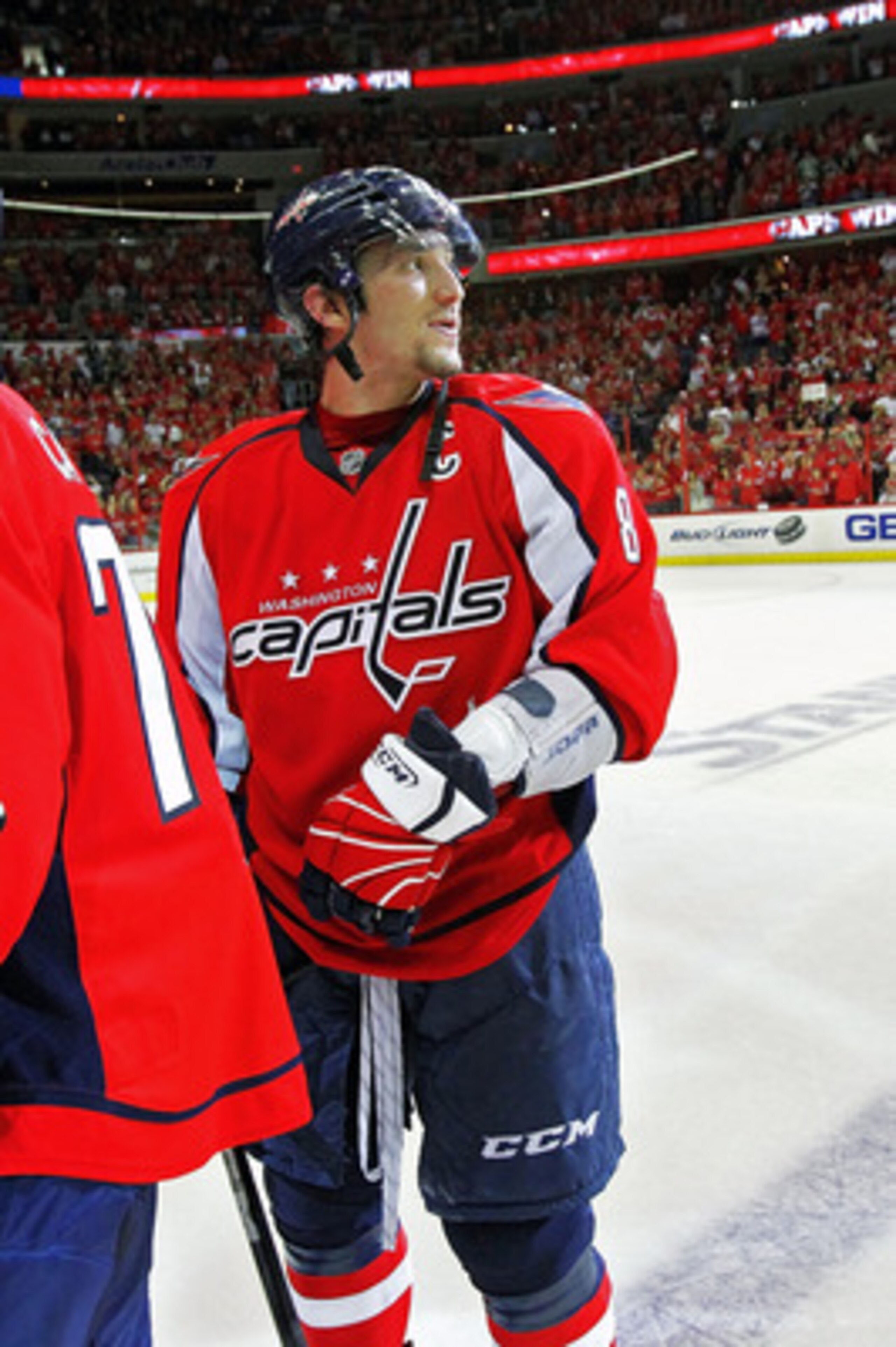 WASHINGTON , DC - APRIL 23:  Alex Ovechkin #8 of the Washington Capitals looks into the crowd following a 3-1 win over the New York Rangers in Game Five of the Eastern Conference Quarterfinals during the 2011 NHL Stanley Cup Playoffs at the Verizon Center