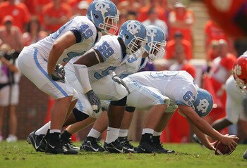 CLEMSON, SC - SEPTEMBER 23:  (L-R) Ryan Taylor #49, Melik Brown #58, Patrick Marsh #63 and Nick Starcevic #43 of the University of North Carolina Tar Heels line up at the line of scrimmage against the Clemson Tigers during their game on September 23, 2006