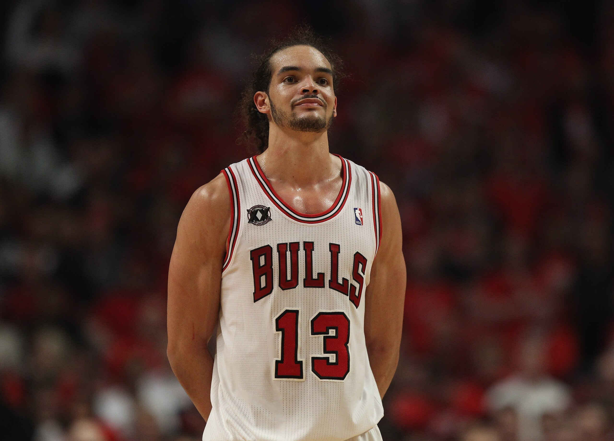 CHICAGO, IL - APRIL 26: Joakim Noah #13 of the Chicago Bulls smiles at family in the stands near the end of a win over the Indiana Pacers in Game Five of the Eastern Conference Quarterfinals in the 2011 NBA Playoffs at the United Center on April 26, 2011