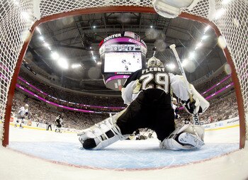 PITTSBURGH, PA - APRIL 27:  Marc-Andre Fleury #29 of the Pittsburgh Penguins protects the net against the Tampa Bay Lightning in Game Seven of the Eastern Conference Quarterfinals during the 2011 NHL Stanley Cup Playoffs at Consol Energy Center on April 2