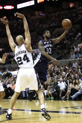 SAN ANTONIO, TX - APRIL 27: O.J. Mayo #32 of the Memphis Grizzlies shoots against Richard Jefferson #24 of the San Antionio Spurs in Game Five of the Western Conference Quarterfinals in the 2011 NBA Playoffs on April 27, 2011 at AT&T Center in San Antoni SAN ANTONIO, TX - APRIL 27: O.J. Mayo #32 of the Memphis Grizzlies shoots against Richard Jefferson #24 of the San Antionio Spurs in Game Five of the Western Conference Quarterfinals in the 2011 NBA Playoffs on April 27, 2011 at AT&T Center in San Antoni