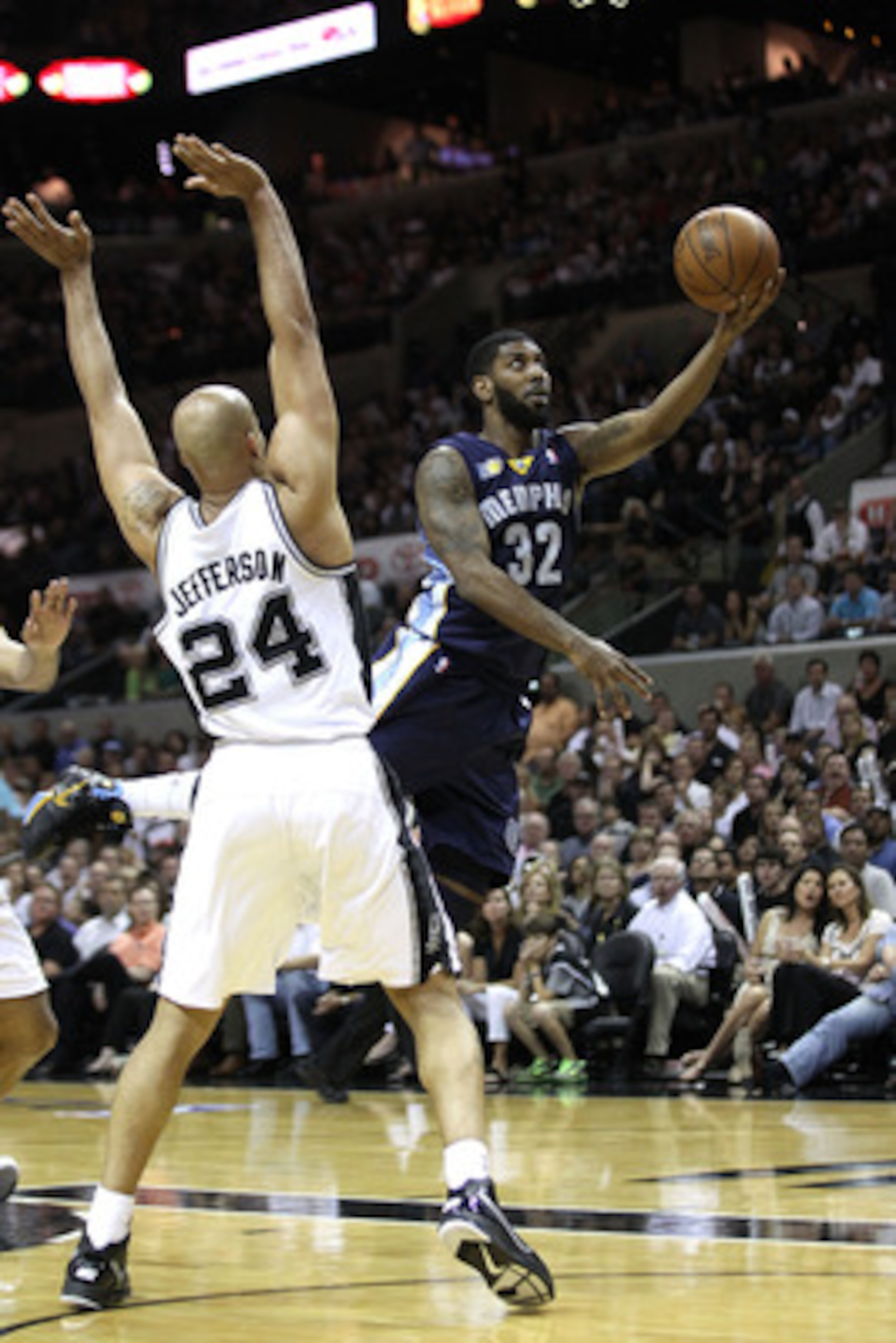 SAN ANTONIO, TX - APRIL 27:  O.J. Mayo #32 of the Memphis Grizzlies shoots against Richard Jefferson #24 of the San Antionio Spurs in Game Five of the Western Conference Quarterfinals in the 2011 NBA Playoffs on April 27, 2011 at AT&T Center in San Antoni