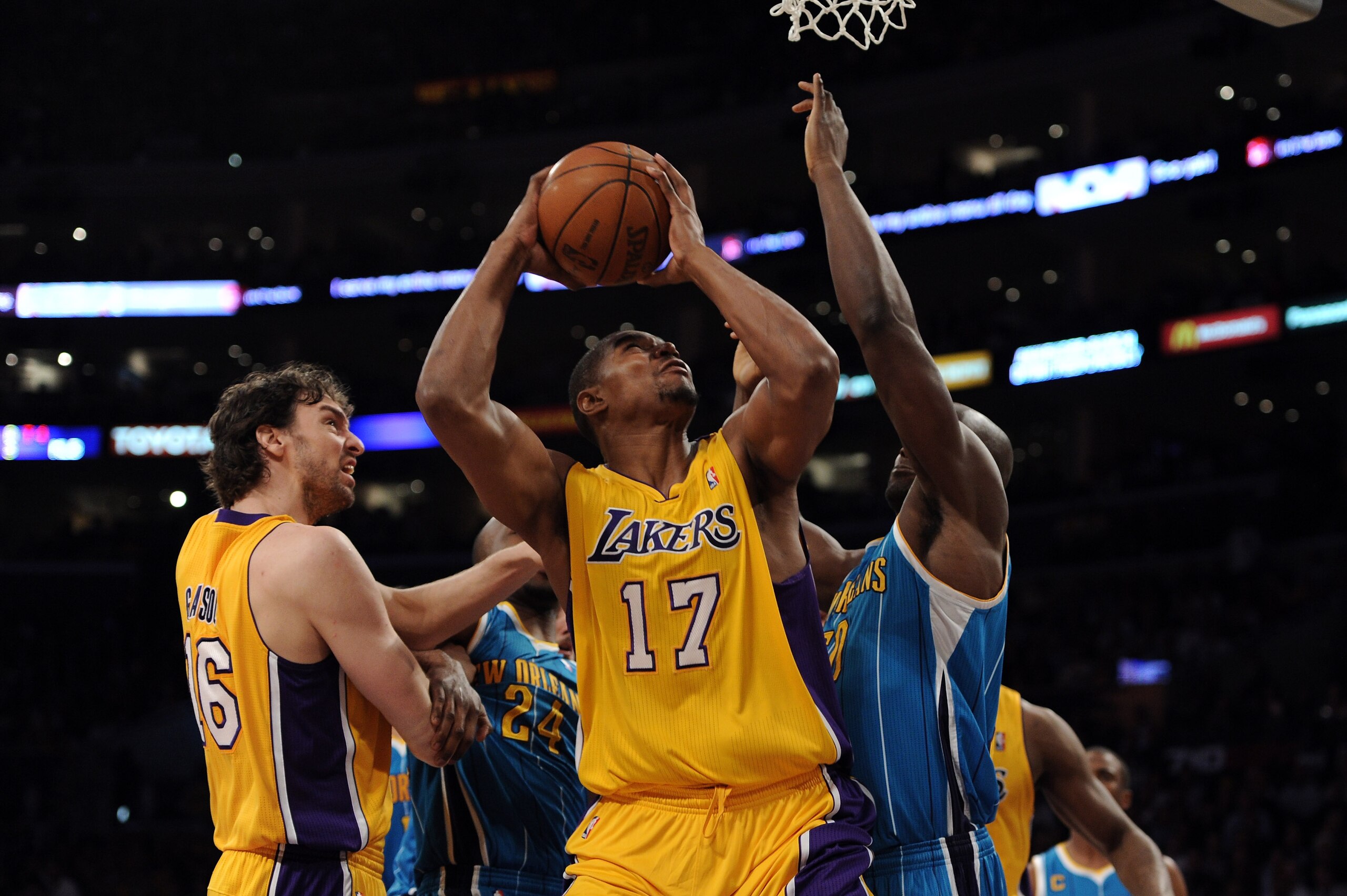 LOS ANGELES, CA - APRIL 26:  Andrew Bynum #17 of the Los Angeles Lakers looks to shoot over Emeka Okafor #50 of the New Orleans Hornets in the first quarter in Game Five of the Western Conference Quarterfinals in the 2011 NBA Playoffs on April 26, 2011 at