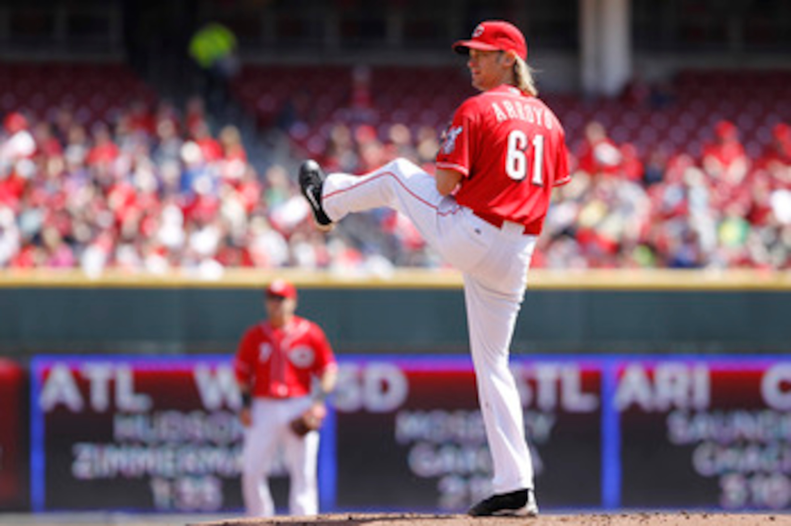 CINCINNATI, OH - APRIL 3: Bronson Arroyo #61 of the Cincinnati Reds pitches against the Milwaukee Brewers at Great American Ball Park on April 3, 2011 in Cincinnati, Ohio. The Reds won 12-3. (Photo by Joe Robbins/Getty Images)