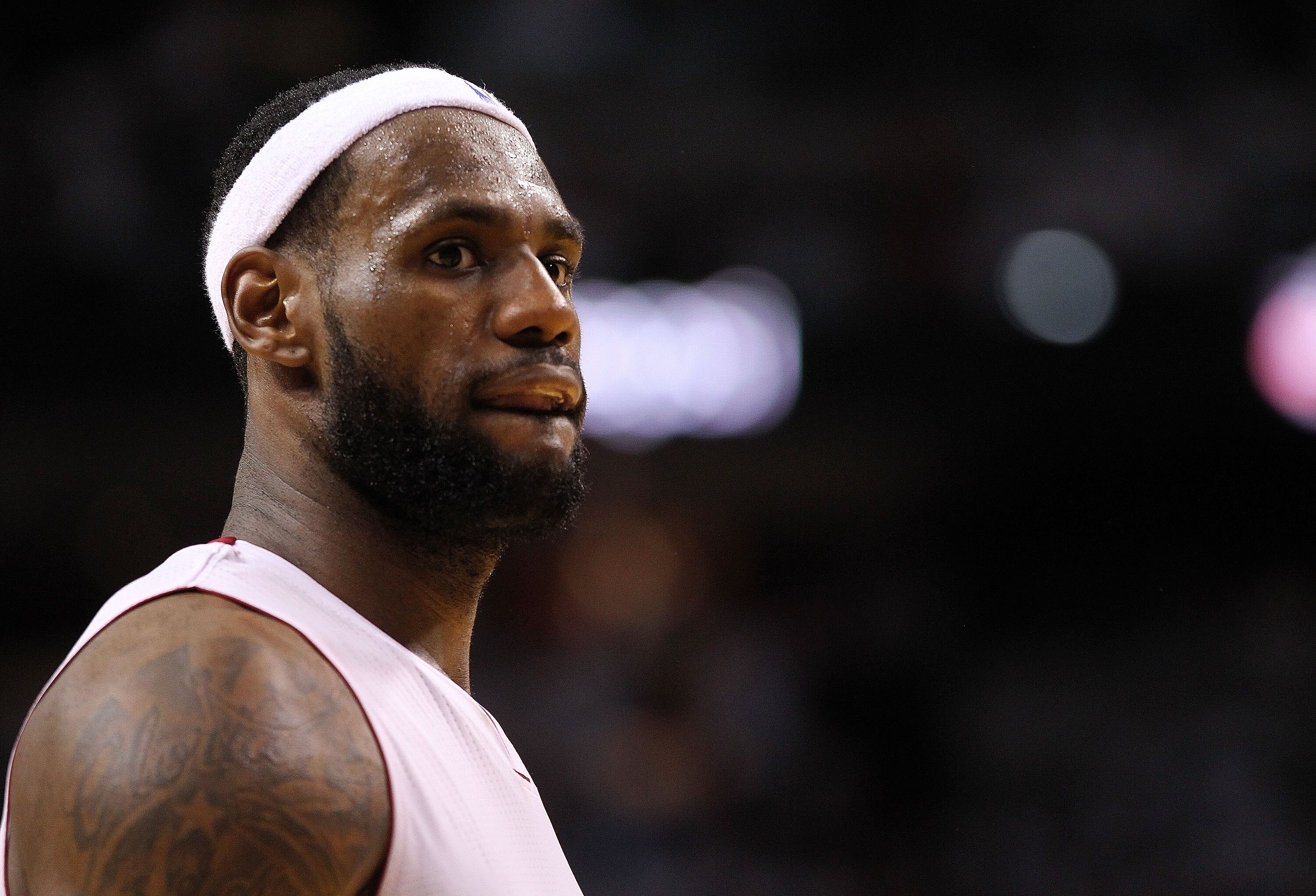 MIAMI, FL - APRIL 27: LeBron James #6 of the Miami Heat looks on during game five of the Eastern Conference Quarterfinals in the 2011 NBA Playoffs against the Philadelphia 76ers at American Airlines Arena on April 27, 2011 in Miami, Florida. NOTE TO USE MIAMI, FL - APRIL 27: LeBron James #6 of the Miami Heat looks on during game five of the Eastern Conference Quarterfinals in the 2011 NBA Playoffs against the Philadelphia 76ers at American Airlines Arena on April 27, 2011 in Miami, Florida. NOTE TO USE