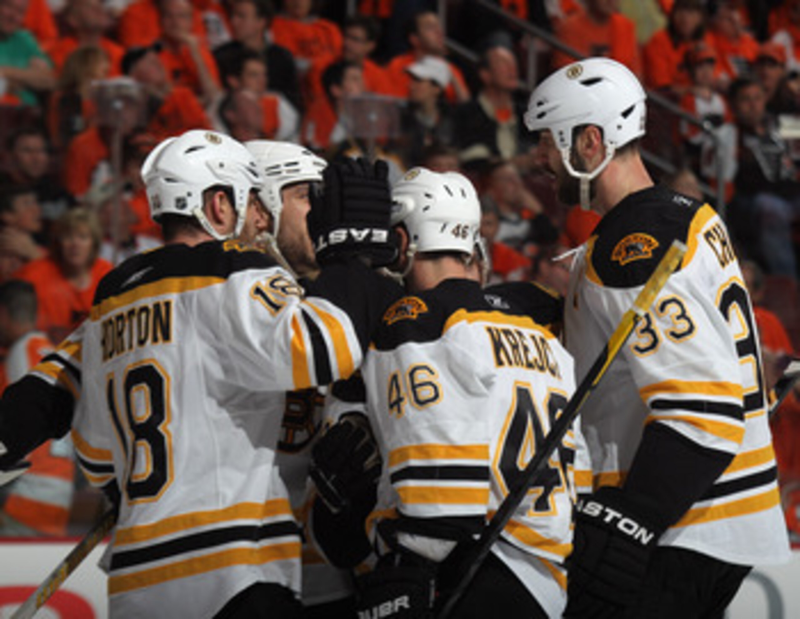 PHILADELPHIA, PA - APRIL 30: Nathan Horton #18 of the Boston Bruins scores at 19:24 of the first period against the Philadelphia Flyers and is joined by David Krejci #46 and Zdeno Chara #33 in Game One of the Eastern Conference Semifinals during the 2011 
