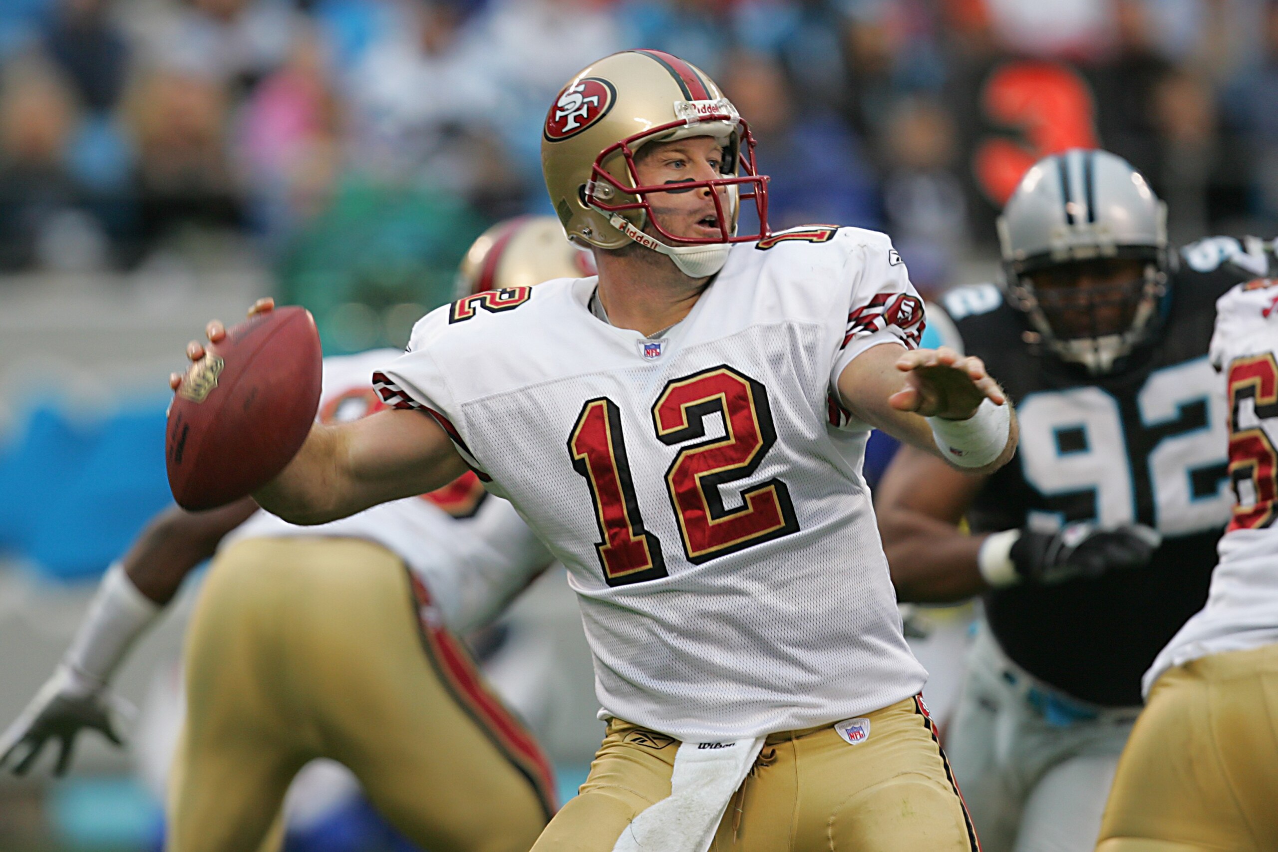 CHARLOTTE - DECEMBER 2: Trent Dilfer #12 of the San Francisco 49ers fades back to pass during the NFL game against the Carolina Panthers at the Bank of America Stadium on December 2, 2007 in Charlotte, North Carolina. (Photo by Streeter Lecka/Getty Image CHARLOTTE - DECEMBER 2: Trent Dilfer #12 of the San Francisco 49ers fades back to pass during the NFL game against the Carolina Panthers at the Bank of America Stadium on December 2, 2007 in Charlotte, North Carolina. (Photo by Streeter Lecka/Getty Image