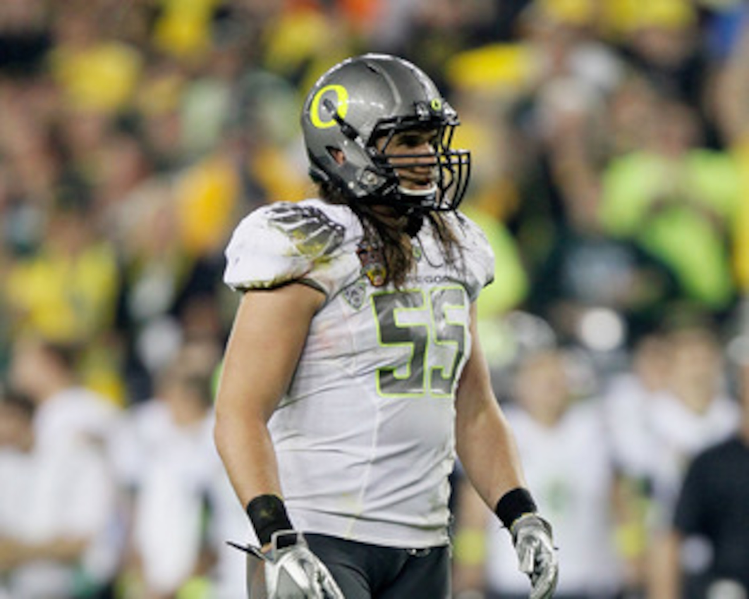 GLENDALE, AZ - JANUARY 10:  Casey Matthews #55 of the Oregon Ducks looks on against the Auburn Tigers during the Tostitos BCS National Championship Game at University of Phoenix Stadium on January 10, 2011 in Glendale, Arizona.  (Photo by Kevin C. Cox/Get