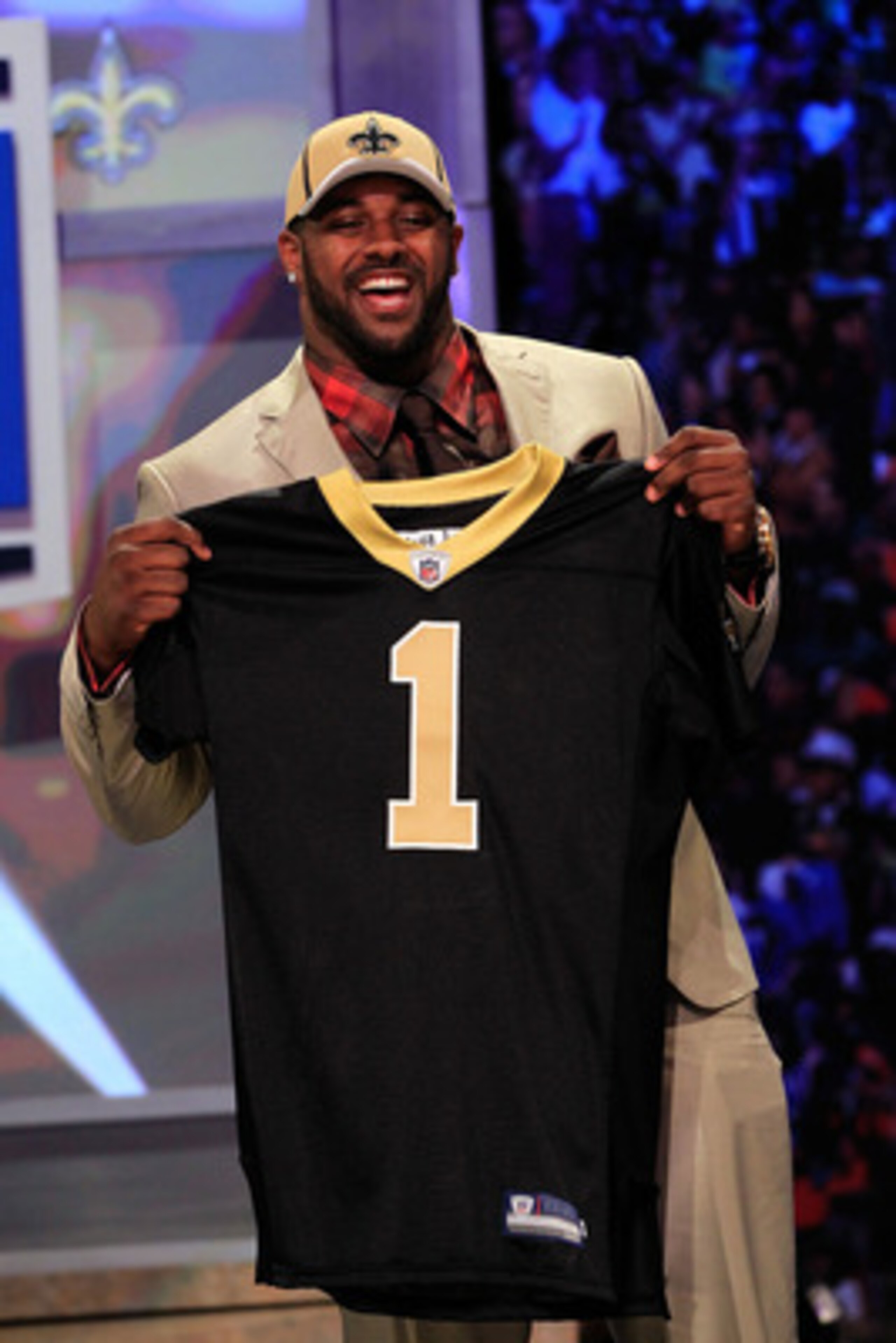 NEW YORK, NY - APRIL 28: Cameron Jordan, #24 overall pick by the New Orleans Saints, holds up a jersey on stage during the 2011 NFL Draft at Radio City Music Hall on April 28, 2011 in New York City. (Photo by Chris Trotman/Getty Images) NEW YORK, NY - APRIL 28: Cameron Jordan, #24 overall pick by the New Orleans Saints, holds up a jersey on stage during the 2011 NFL Draft at Radio City Music Hall on April 28, 2011 in New York City. (Photo by Chris Trotman/Getty Images)