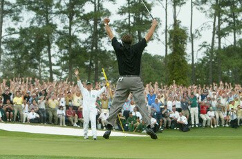 AUGUSTA, GA - APRIL 11:  Phil Mickelson  jumps in the air after sinking his birdie putt to win the Masters by one shot on the 18th green during the final round of the Masters at the Augusta National Golf Club on April 11, 2004 in Augusta, Georgia.  (Photo