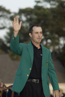AUGUSTA, GA - APRIL 13:  Mike Weir of Canada wears the green jacket after winning the play off after the final round of the 2003 Masters Tournament at the Augusta National Golf Club in Augusta, Georgia on April 13, 2003. (Photo by Andrew Redington/Getty I