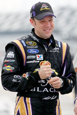 DAYTONA BEACH, FL - FEBRUARY 16:  Matt Kenseth, driver of the #17 Crown Royal Ford, stands in the garage area during practice for the NASCAR Sprint Cup Series Daytona 500 at Daytona International Speedway on February 16, 2011 in Daytona Beach, Florida.  (