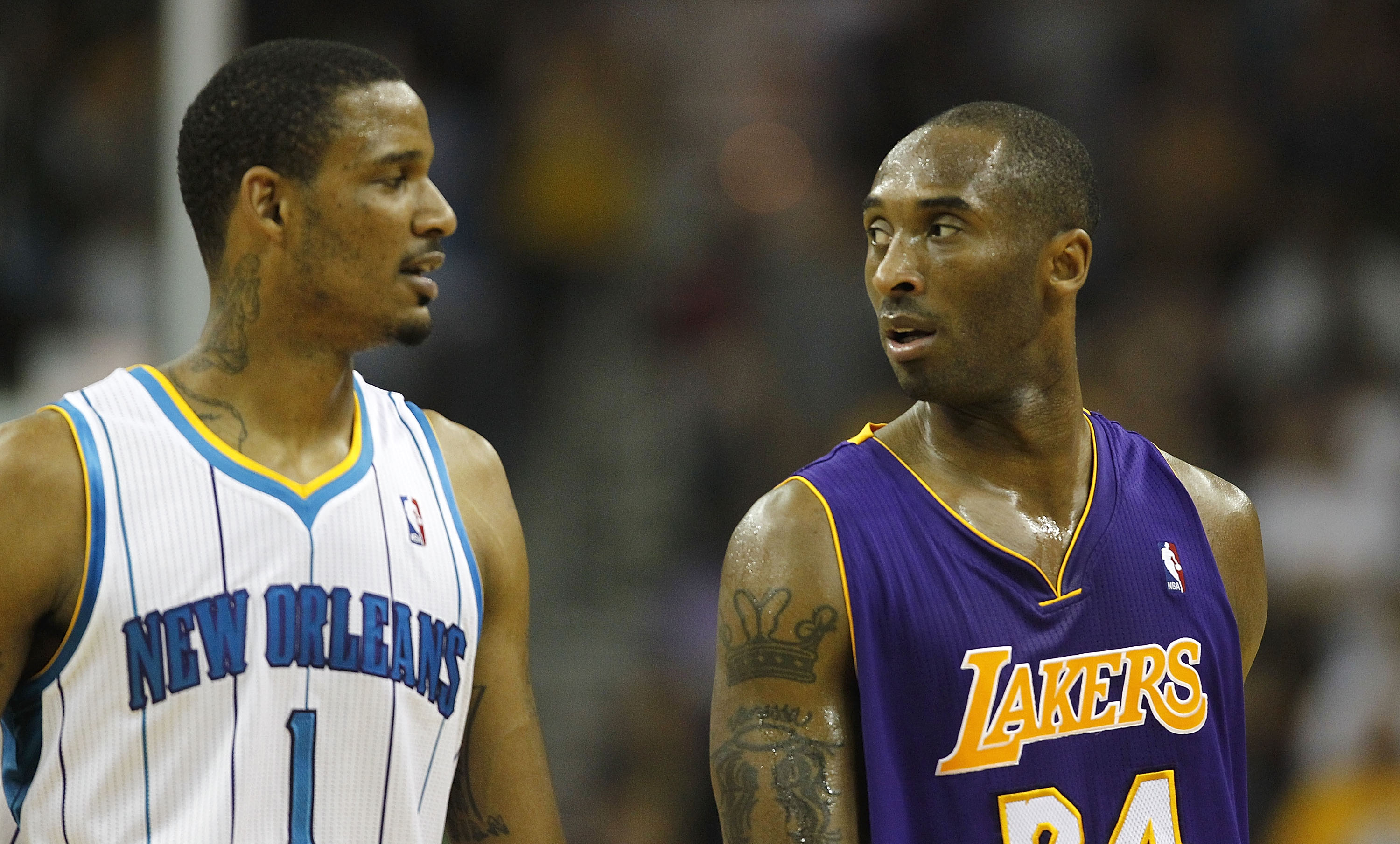 NEW ORLEANS - APRIL 24:  Kobe Bryant #24 of the Los Angeles Lakers looks at Trevor Ariza #1 of the New Orleans Hornets after Bryant was charged with a technical foul in Game Four of the Western Conference Quarterfinals in the 2011 NBA Playoffs at New Orle