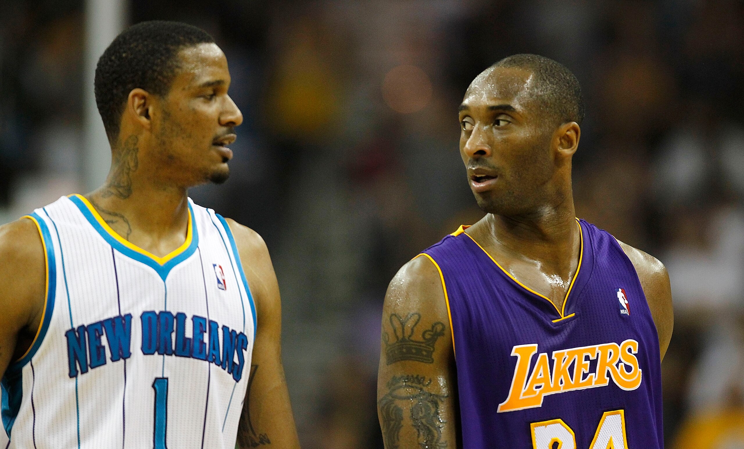 NEW ORLEANS - APRIL 24:  Kobe Bryant #24 of the Los Angeles Lakers looks at Trevor Ariza #1 of the New Orleans Hornets after Bryant was charged with a technical foul in Game Four of the Western Conference Quarterfinals in the 2011 NBA Playoffs at New Orle
