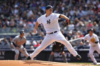 NEW YORK, NY - APRIL 03:  Phil Hughes #65 of the New York Yankees pitches against the Detroit Tigers at Yankee Stadium on April 3, 2011 in the Bronx borough of New York City.  (Photo by Nick Laham/Getty Images)