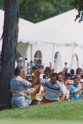 MEDINAH, ILLINOIS - 1990:  Hale Irwin of the USA celebrates victory with a lap of honour on the 18th hole during the 1990 US Open held at the Medinah Country Club, in Medinah, Illinois, USA. (Photo by Stephen Munday/Getty Images)