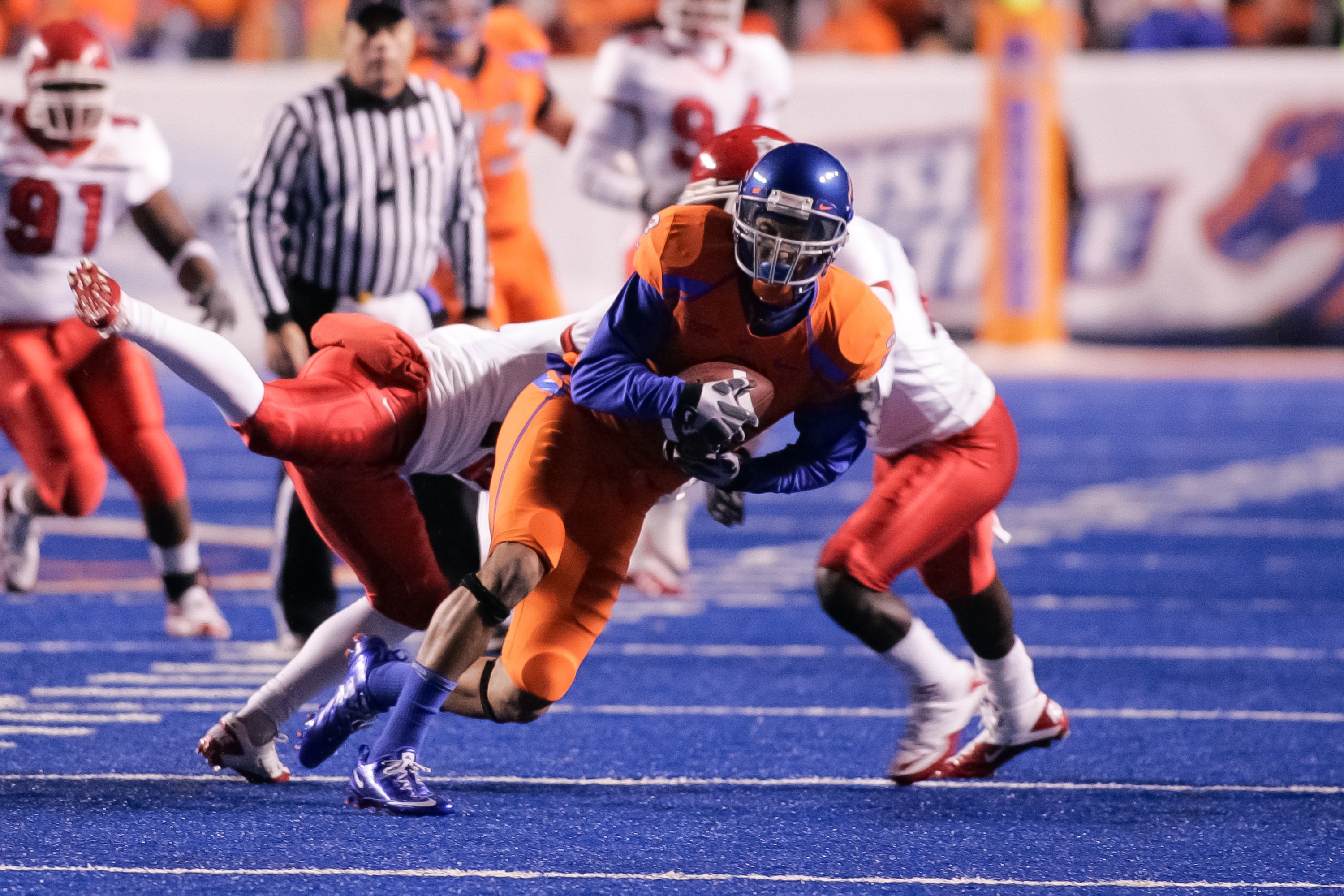 BOISE, ID - NOVEMBER 19:  Austin Pettis #2 of the Boise State Broncos runs after a catch against the Fresno State Bulldogs at Bronco Stadium on November 19, 2010 in Boise, Idaho.  (Photo by Otto Kitsinger III/Getty Images)