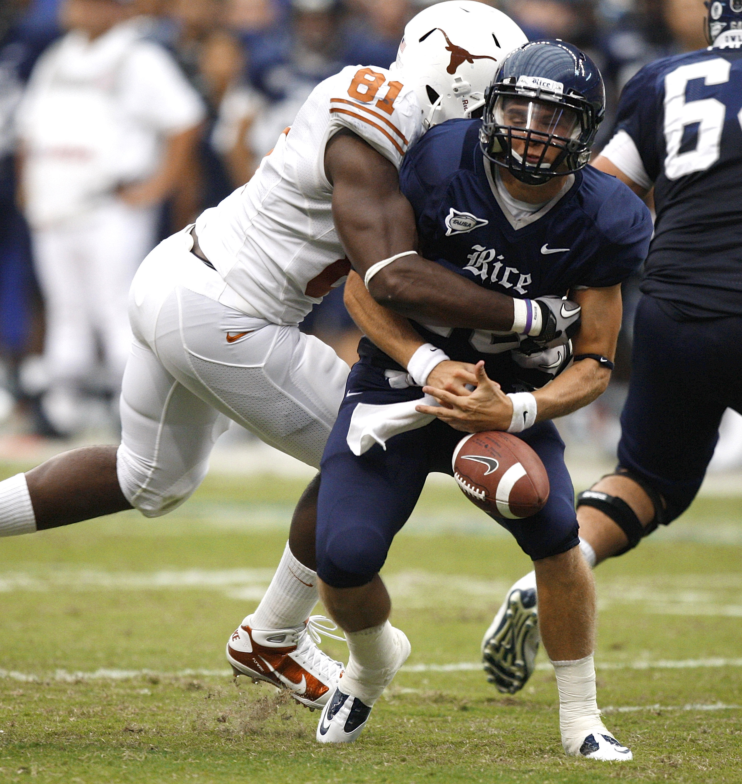 HOUSTON - SEPTEMBER 04:  Quarterback Taylor McHargue #16 of the Rice Owls loses the ball after he is sacked by defensive end Sam Acho #81 of the Texas Longhorns at Reliant Stadium on September 4, 2010 in Houston, Texas. Texas recovered the fumble and scor