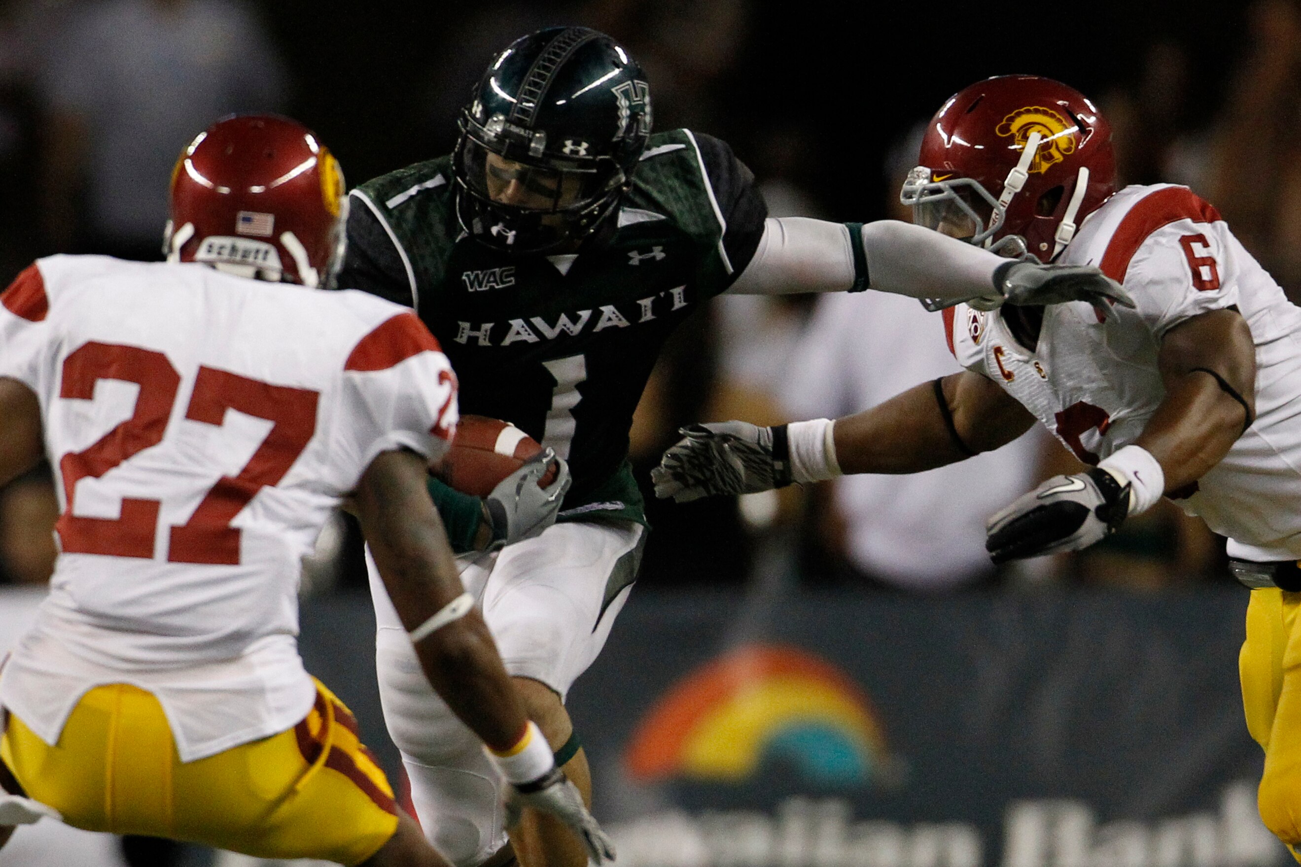 HONOLULU - SEPTEMBER 2:  Greg Salas of the University of Hawaii Warriors runs the ball during second half action at Aloha Stadium September 2, 2010 in Honolulu, Hawaii. (Photo by Kent Nishimura/Getty Images)