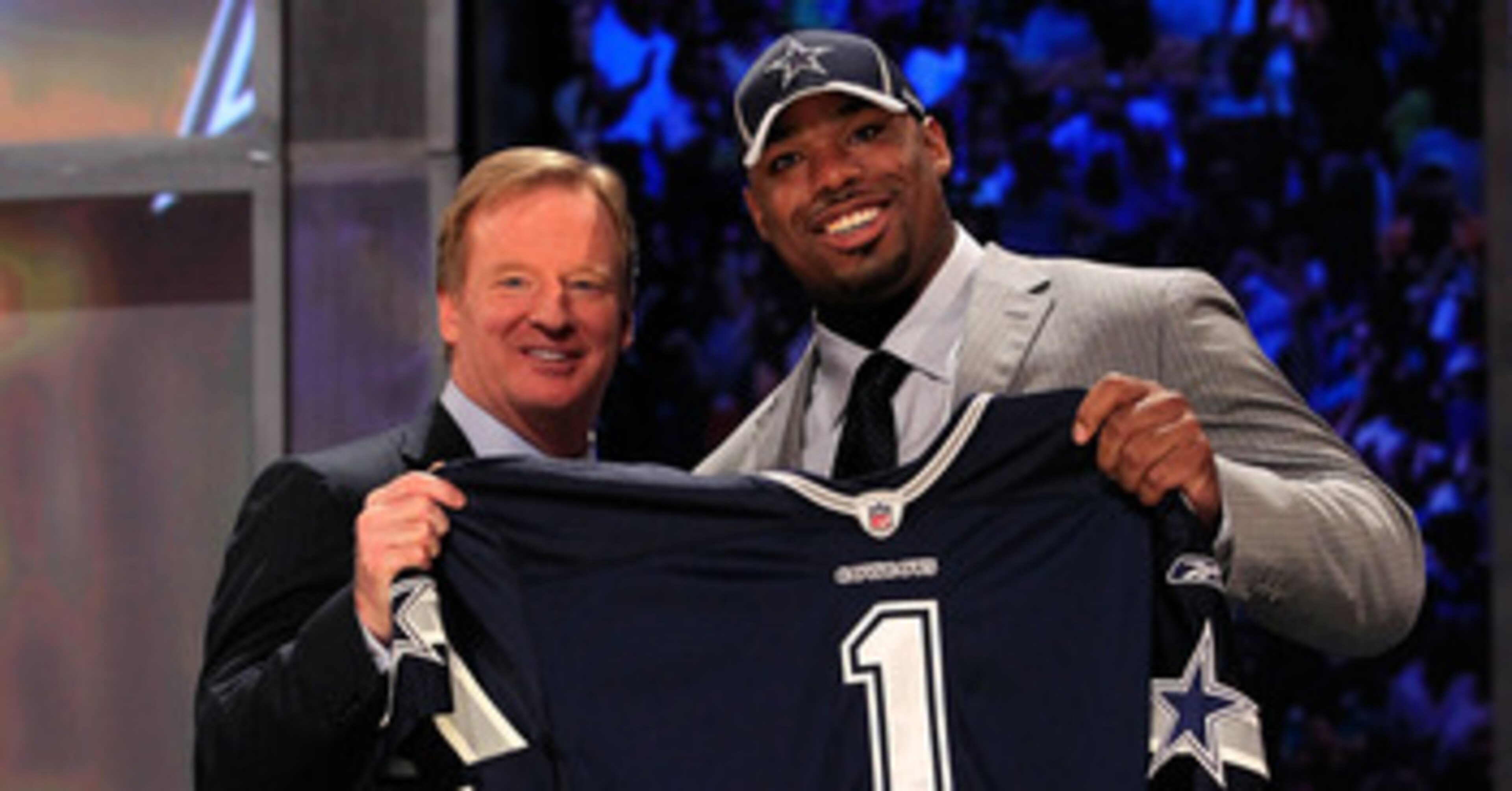 NEW YORK, NY - APRIL 28:  NFL Commissioner Roger Goodell (L) poses for a photo with Tyron Smith, #9 overall pick by the Dallas Cowboys, on stage during the 2011 NFL Draft at Radio City Music Hall on April 28, 2011 in New York City.  (Photo by Chris Trotma