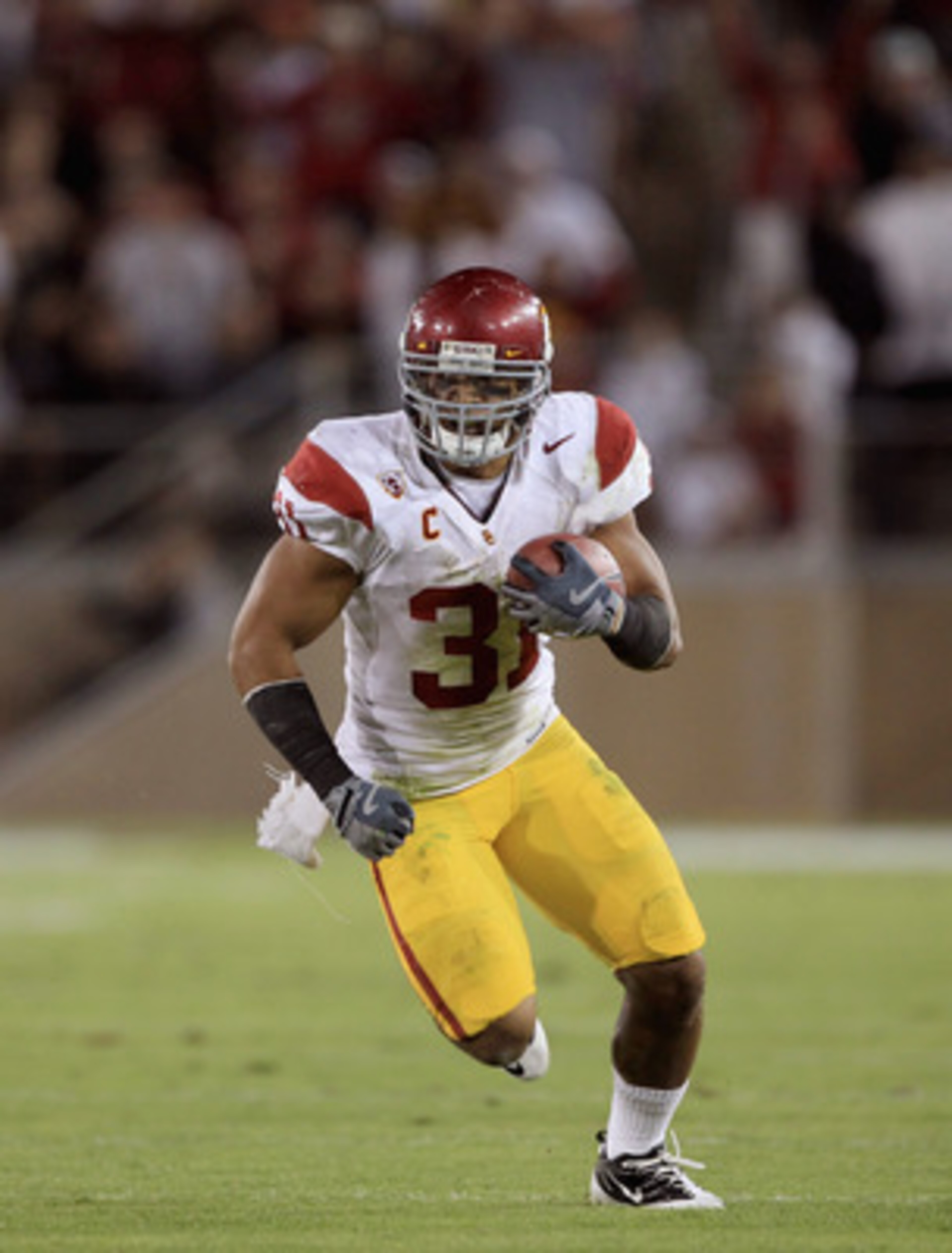 PALO ALTO, CA - OCTOBER 09:  Stanley Havili #31 of the USC Trojans runs with the ball during their game against the Stanford Cardinal at Stanford Stadium on October 9, 2010 in Palo Alto, California.  (Photo by Ezra Shaw/Getty Images)