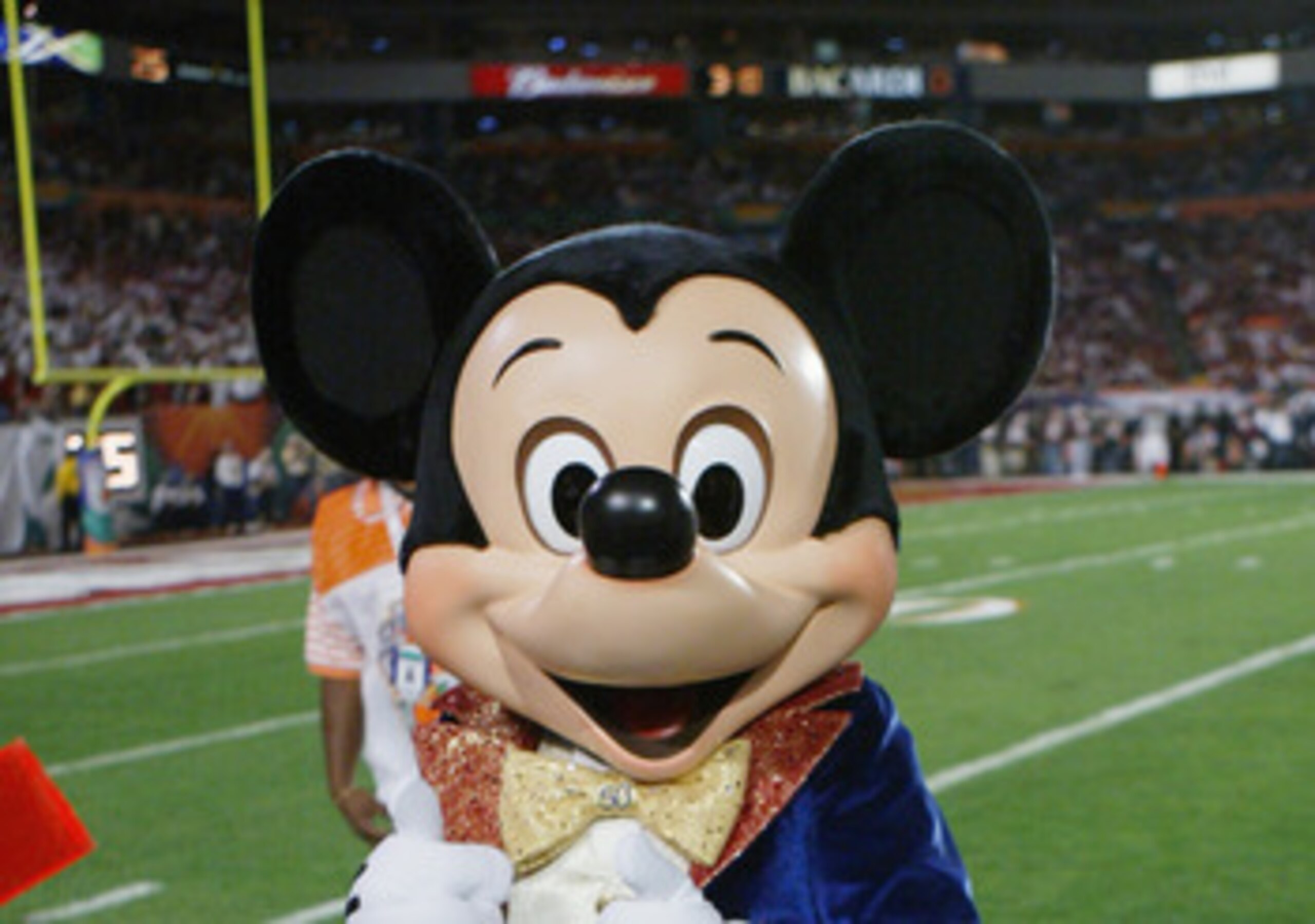 MIAMI - JANUARY 4:  Mickey Mouse is on the sidelines as the USC Trojans face the Oklahoma Sooners in the 2005 FedEx Orange Bowl National Championship on January 4, 2005 at Pro Player Stadium in Miami, Florida. USC defeated Oklahoma 55-19. (Photo by Doug P