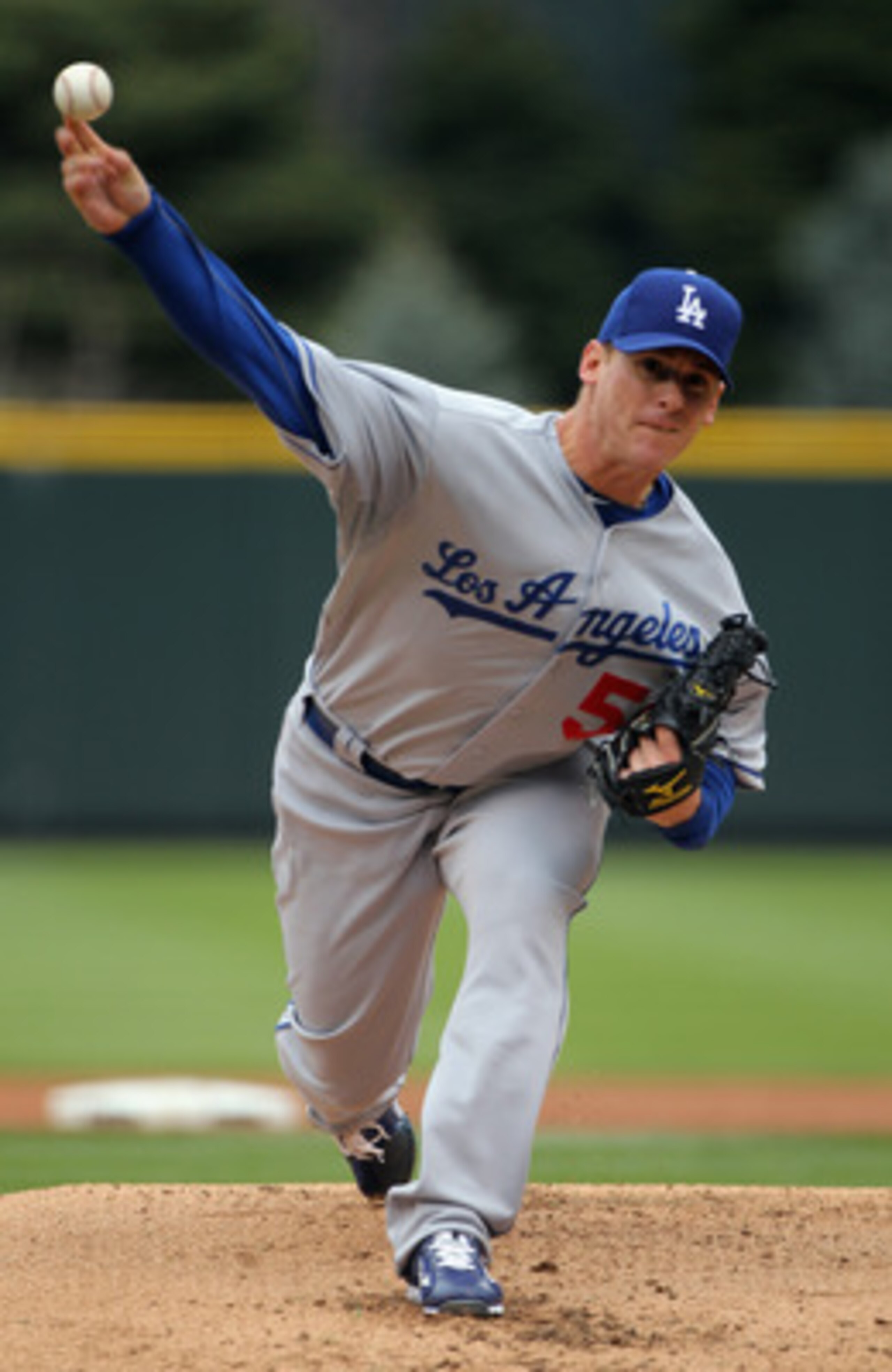 DENVER, CO - APRIL 06:  Starting pitcher Chad Billingsley #58 of the Los Angeles Dodgers delivers against the Colorado Rockies at Coors Field on April 6, 2011 in Denver, Colorado.  (Photo by Doug Pensinger/Getty Images)