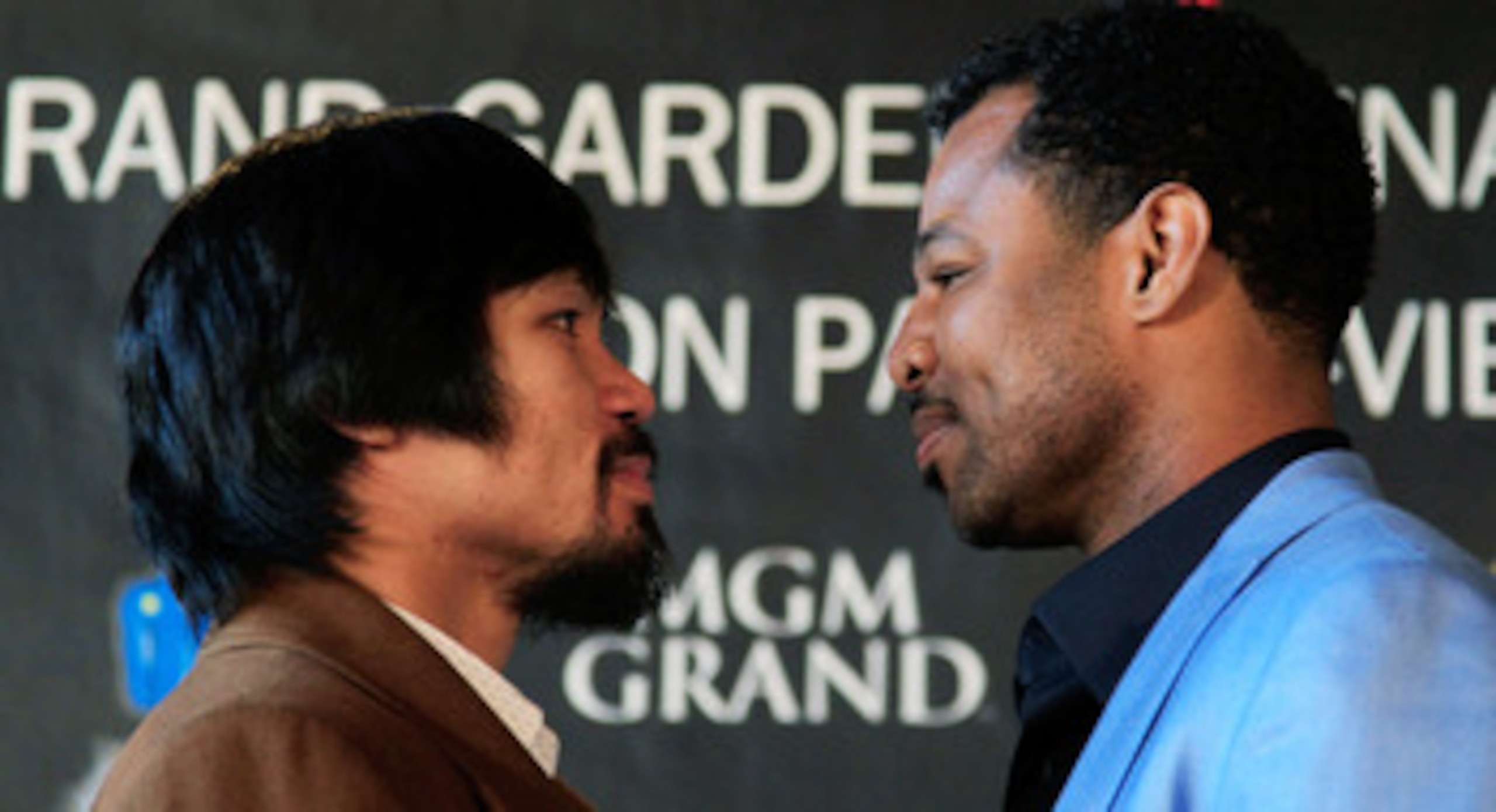NEW YORK, NY - FEBRUARY 14:  (L) Manny Pacquiao and (R) Shane Mosley square up at a press conference to promote their upcoming fight at The Lighthouse at Chelsea Piers on February 14, 2011 in New York City.  (Photo by Chris Trotman/Getty Images)