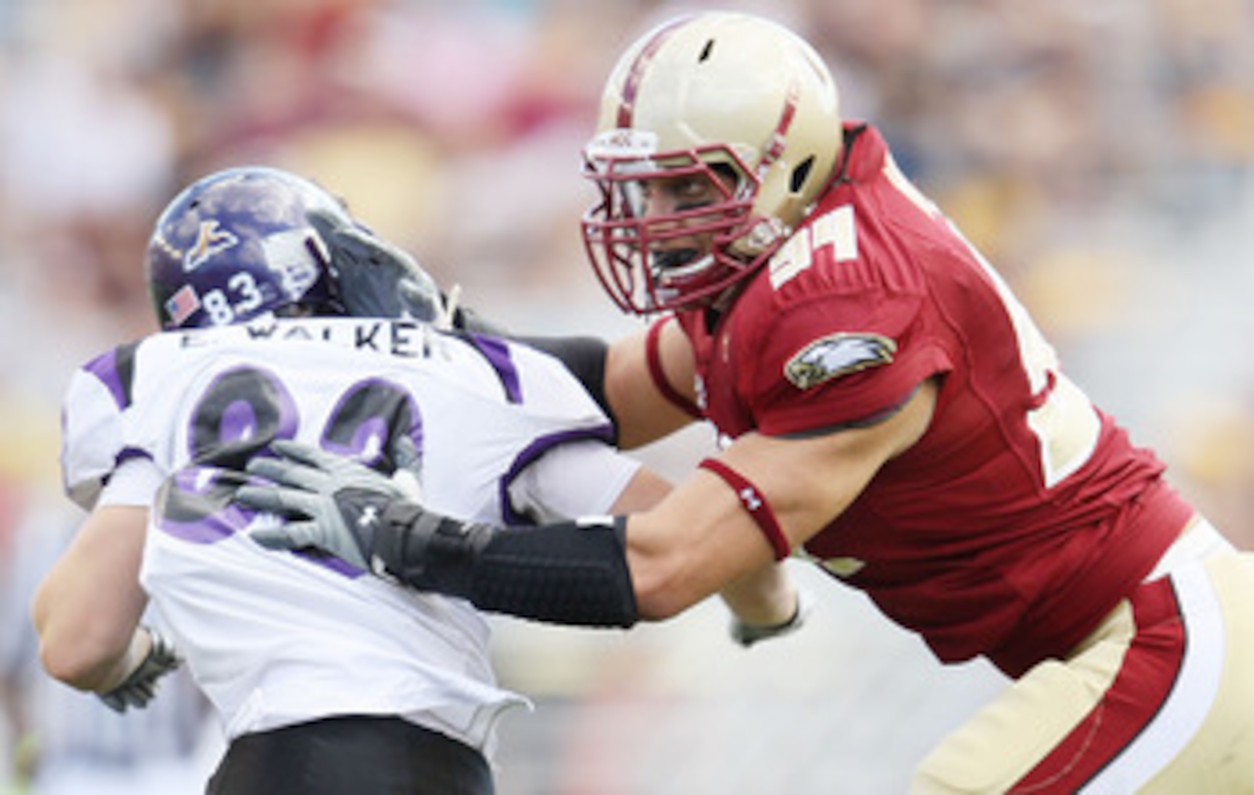 CHESTNUT HILL, MA - SEPTEMBER 04:  Mark Herzlich #94 of the Boston College Eagles blocks Erik Walker #83 of the Weber State Wildcats on September 4, 2010 at Alumni Stadium in Chestnut Hill, Massachusetts. Boston College defeated Weber State 38-20.  (Photo