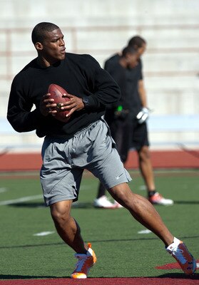 SAN DIEGO, CA - FEBRUARY 10:  2010 Heisman Trophy winning quarterback Cam Newton of the Auburn Tigers goes through his workout routine for the media at Cathedral High School's sports stadium on February 10, 2011 in San Diego, California.  (Photo by Kent H