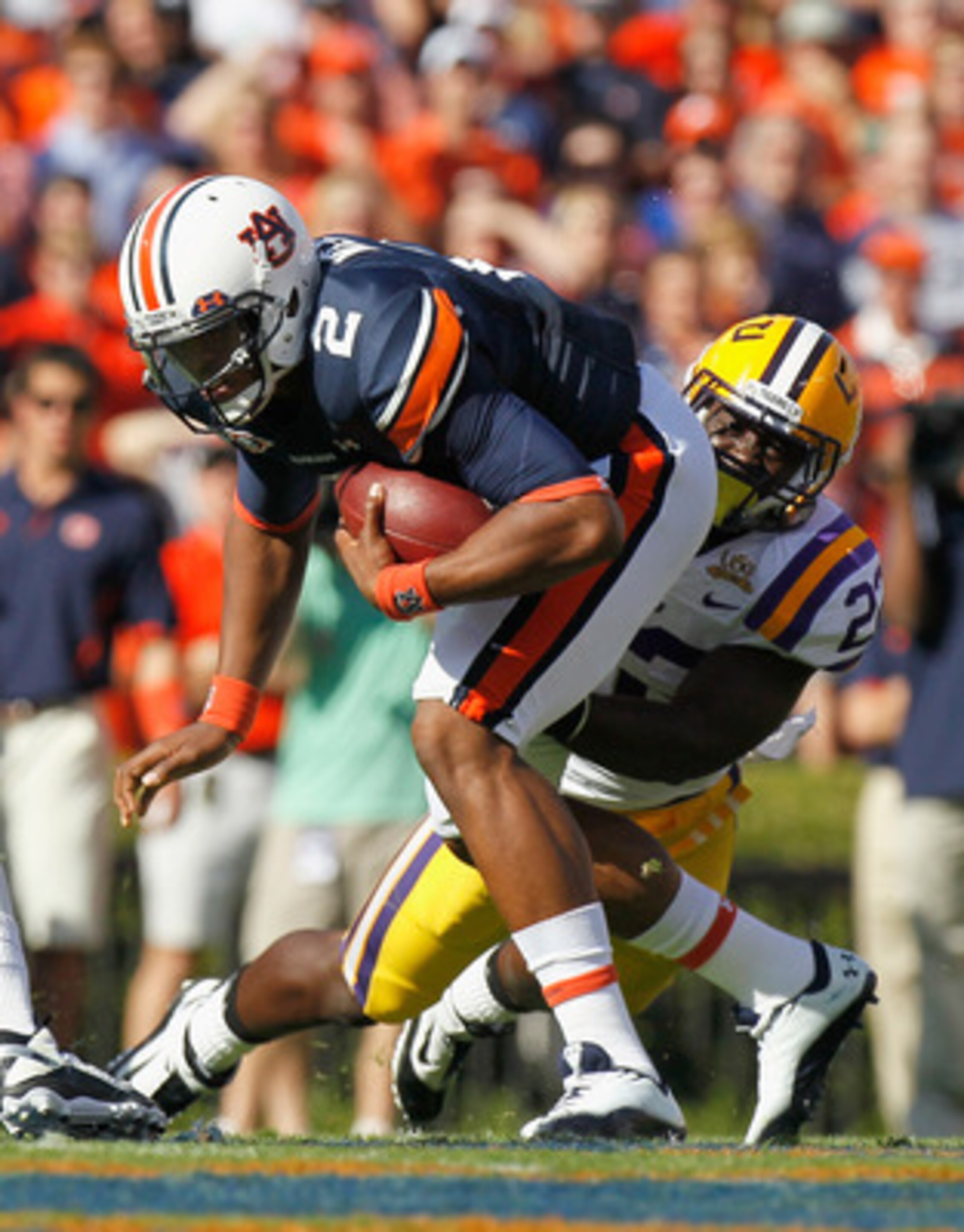 AUBURN, AL - OCTOBER 23:  Ryan Baker #22 of the LSU Tigers sacks quarterback Cameron Newton #2 of the Auburn Tigers at Jordan-Hare Stadium on October 23, 2010 in Auburn, Alabama.  (Photo by Kevin C. Cox/Getty Images)