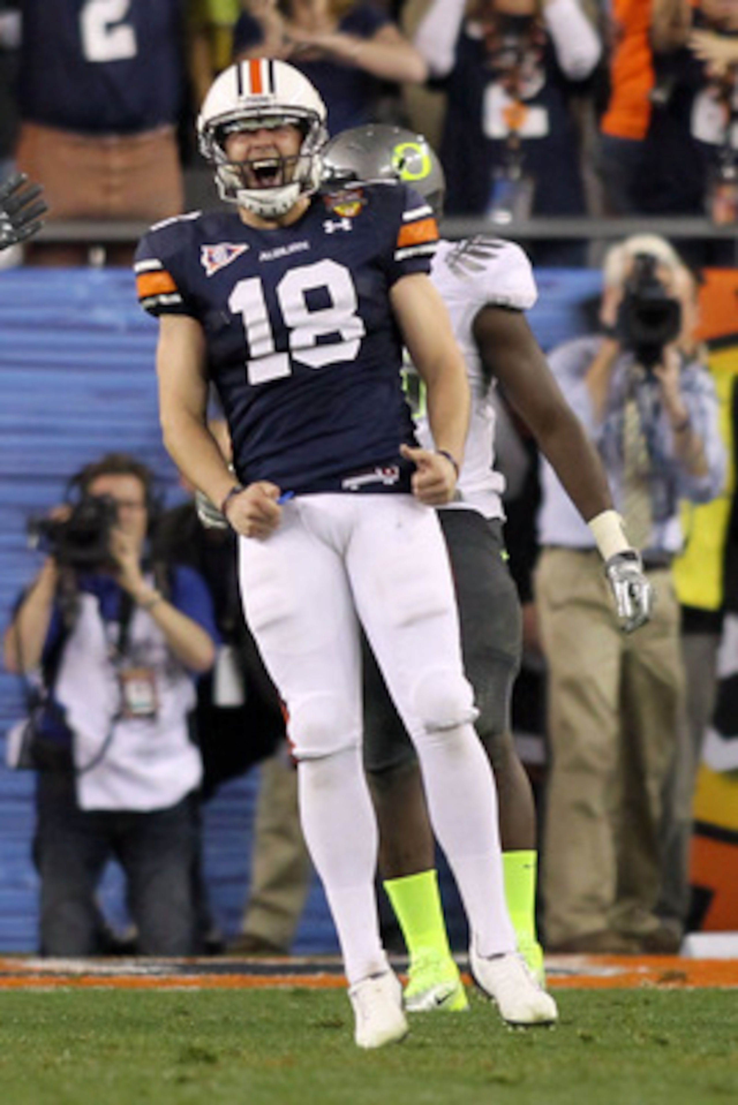 GLENDALE, AZ - JANUARY 10:  Kicker Wes Byrum #18 of the Auburn Tigers reacts after he kicks a 19-yard game-winning field goal to defeat the Oregon Ducks 22-19 in the Tostitos BCS National Championship Game at University of Phoenix Stadium on January 10, 2