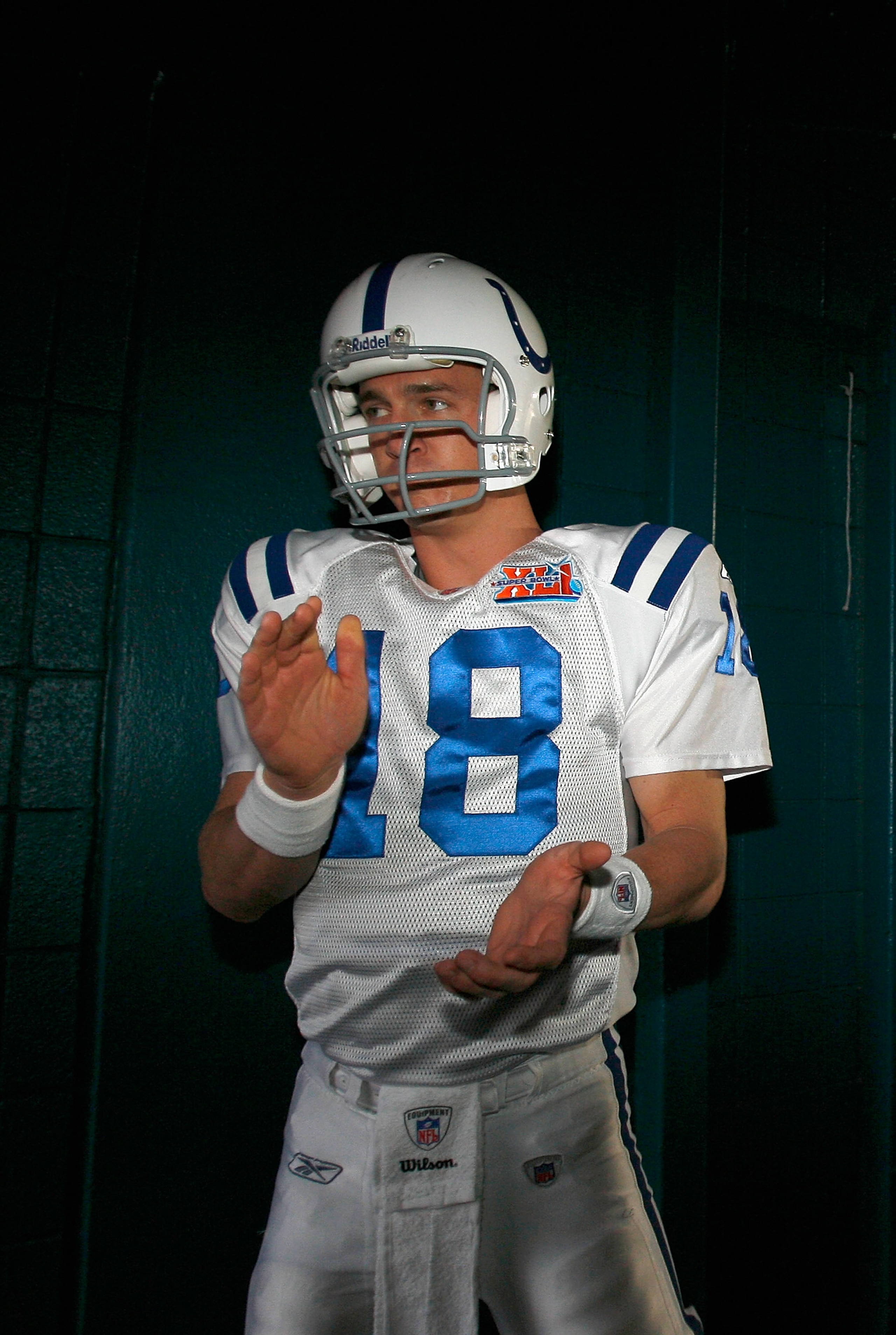 MIAMI GARDENS, FL - FEBRUARY 04:  Quarterback Peyton Manning #18 of the Indianapolis Colts stands in the tunnel before taking the field prior to the start of Super Bowl XLI against the Chicago Bears on February 4, 2007 at Dolphin Stadium in Miami Gardens,