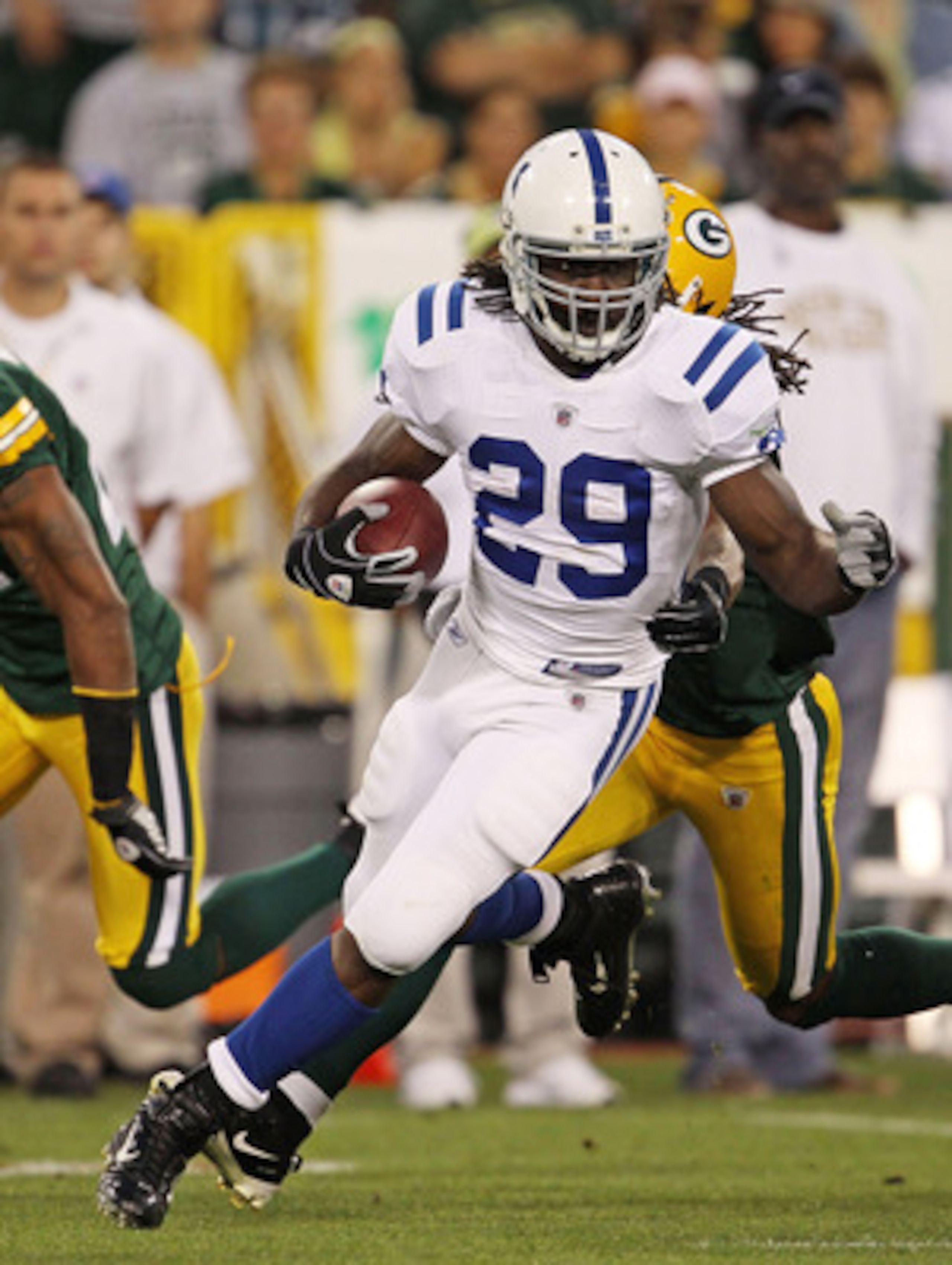 GREEN BAY, WI - AUGUST 26: Joseph Addai #29 of the Indianapolis Colts runs for yardage against the Green Bay Packers during a preseason game at Lambeau Field on August 26, 2010 in Green Bay, Wisconsin. (Photo by Jonathan Daniel/Getty Images)