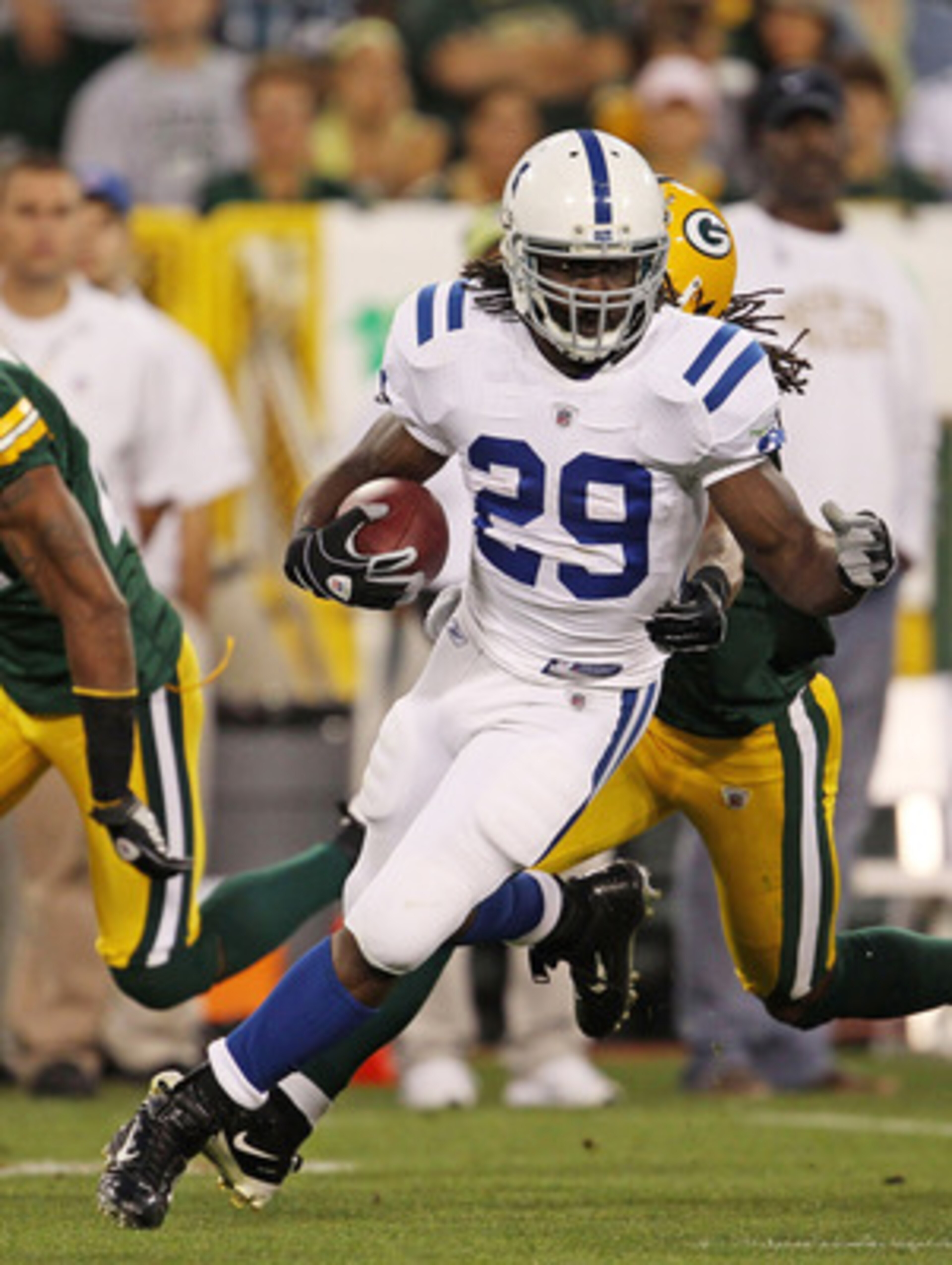 GREEN BAY, WI - AUGUST 26: Joseph Addai #29 of the Indianapolis Colts runs for yardage against the Green Bay Packers during a preseason game at Lambeau Field on August 26, 2010 in Green Bay, Wisconsin. (Photo by Jonathan Daniel/Getty Images)