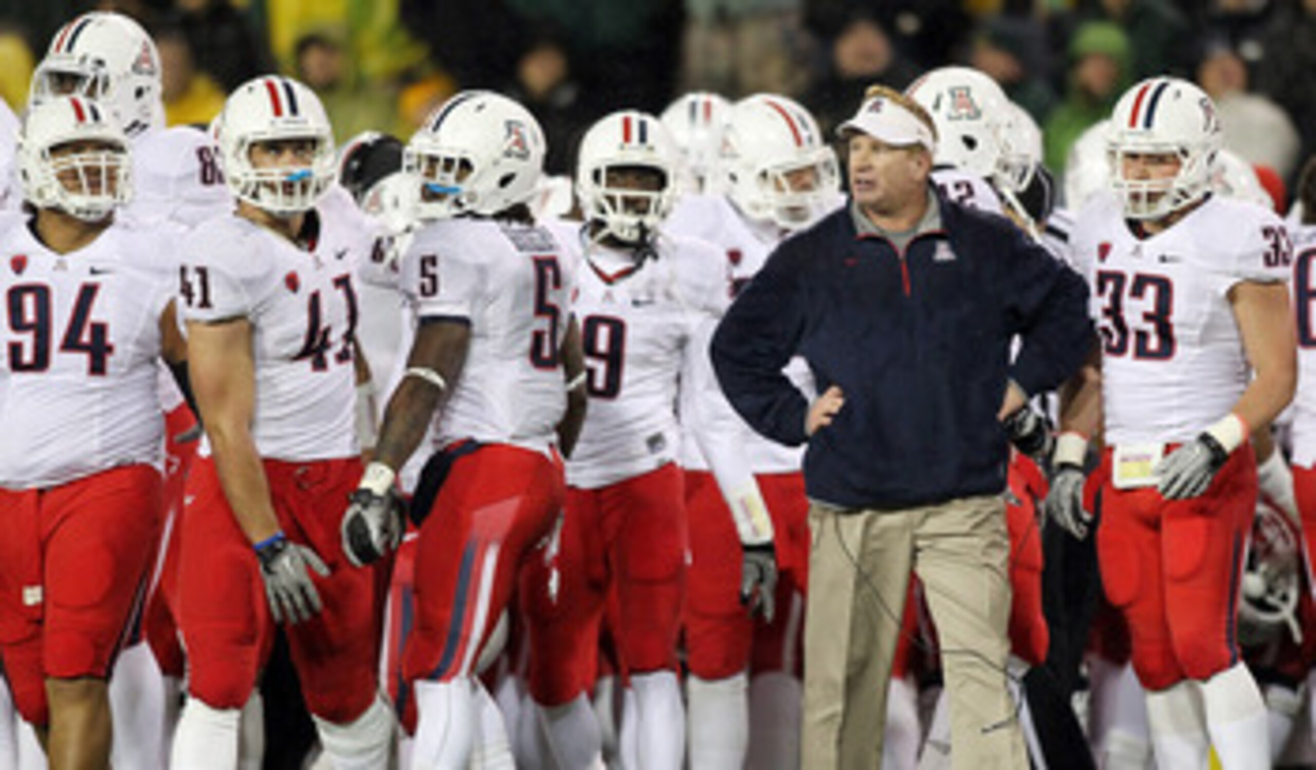 EUGENE, OR - NOVEMBER 26:  Head Coach Mike Stoops of the Arizona Wildcats walks the sidelines against the Oregon Ducks on November 26, 2010 at the Autzen Stadium in Eugene, Oregon.  (Photo by Jonathan Ferrey/Getty Images)