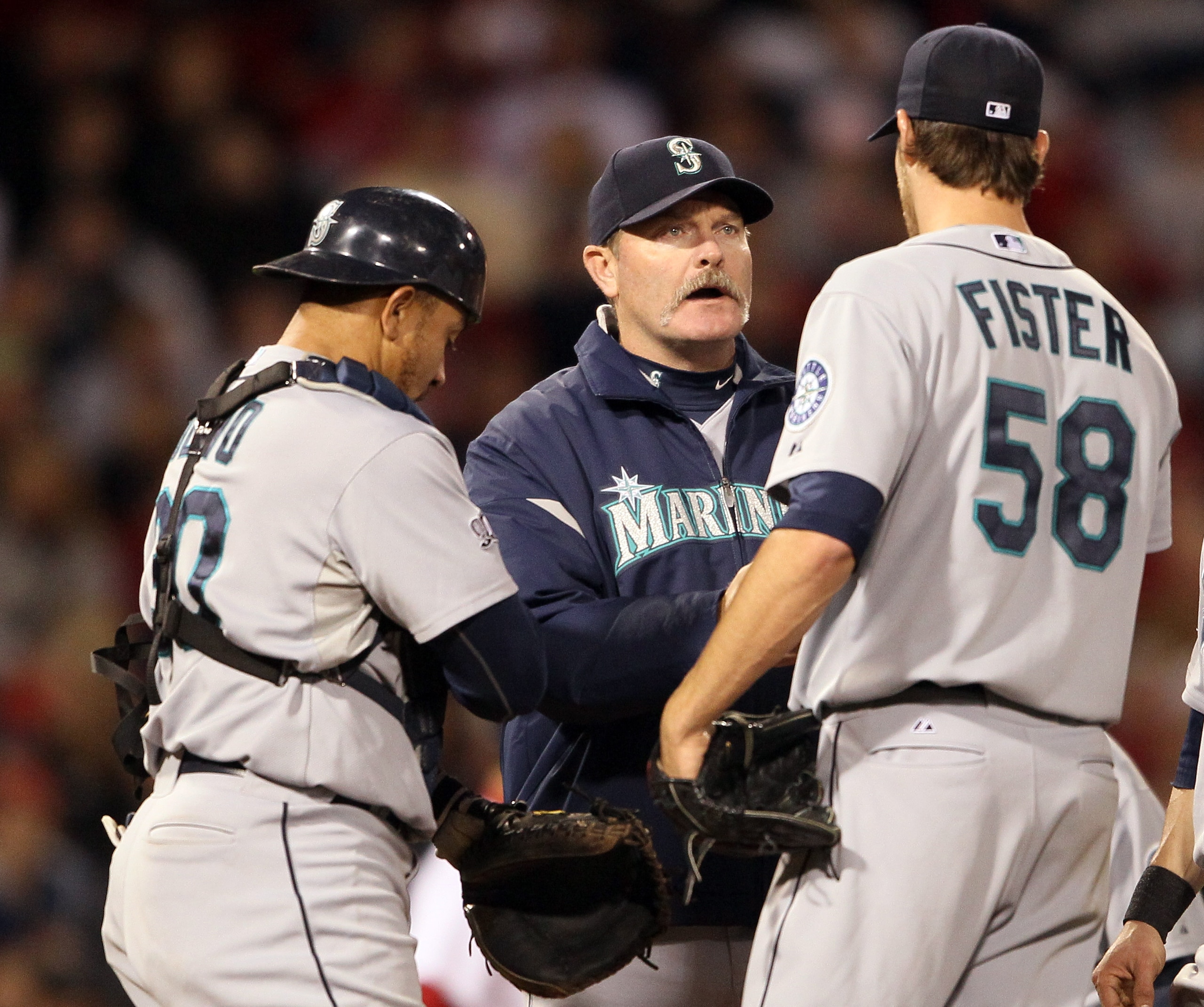 BOSTON, MA - APRIL 30: Manager Eric Wedge #22 of the Seattle Mariners pulls Doug Fister #58 in the sixth inning against the Boston Red Sox as Miguel Olivo #30 stands by on April 30, 2011 at Fenway Park in Boston, Massachusetts. (Photo by Elsa/Getty Image BOSTON, MA - APRIL 30: Manager Eric Wedge #22 of the Seattle Mariners pulls Doug Fister #58 in the sixth inning against the Boston Red Sox as Miguel Olivo #30 stands by on April 30, 2011 at Fenway Park in Boston, Massachusetts. (Photo by Elsa/Getty Image
