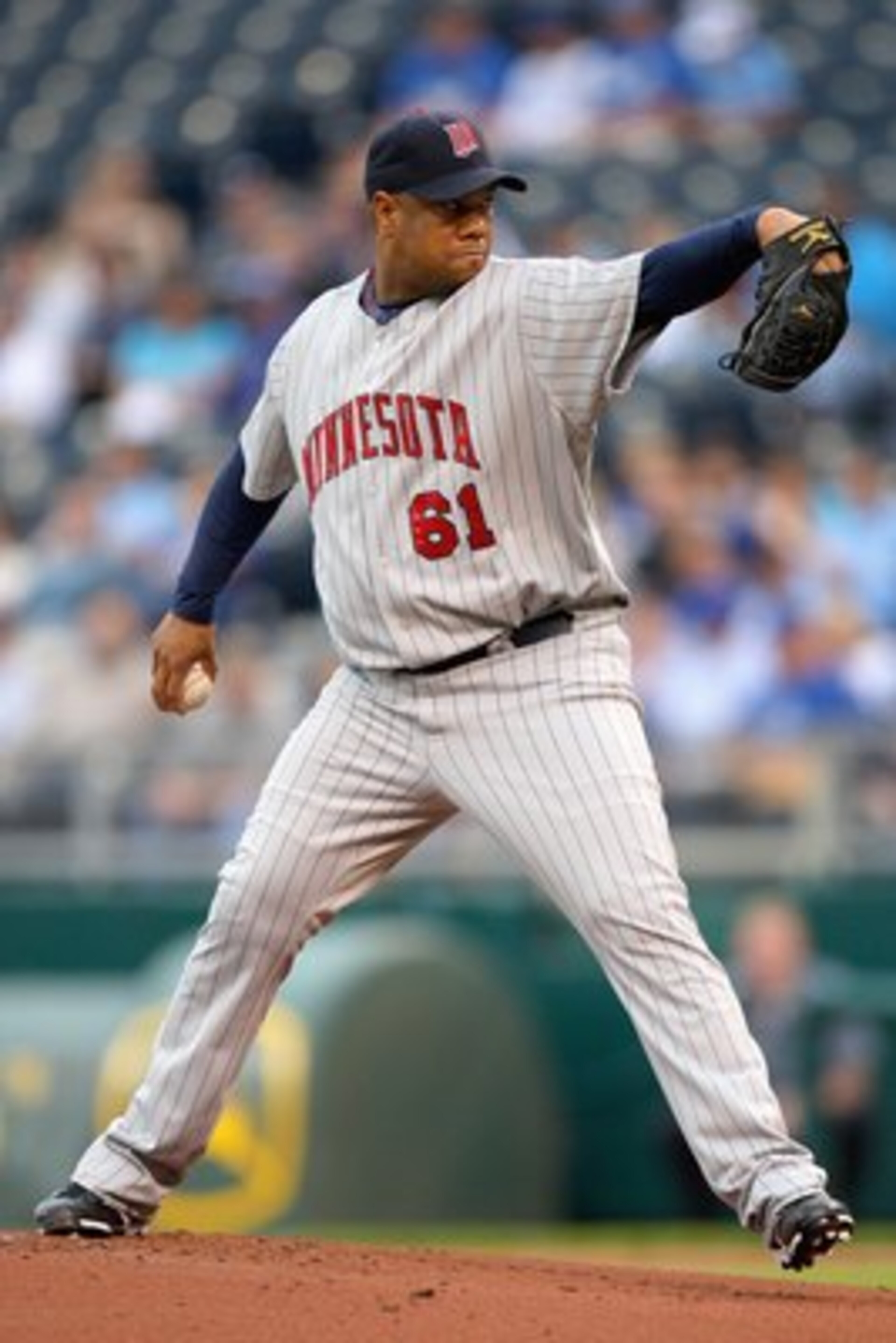 KANSAS CITY, MO - MAY 28:  Livan Hernandez #61 of the Minnesota Twins delivers a pitch against the Kansas City Royals on May 28, 2008 at Kauffman Stadium in Kansas City, Missouri. (Photo by G. Newman Lowrance/Getty Images)