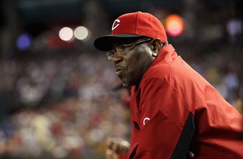 PHOENIX, AZ - APRIL 08: Manager Dusty Baker of the Cincinnati Reds watches from the dugout during the Major League Baseball home opening game against the Arizona Diamondbacks at Chase Field on April 8, 2011 in Phoenix, Arizona. (Photo by Christian Peter PHOENIX, AZ - APRIL 08: Manager Dusty Baker of the Cincinnati Reds watches from the dugout during the Major League Baseball home opening game against the Arizona Diamondbacks at Chase Field on April 8, 2011 in Phoenix, Arizona. (Photo by Christian Peter