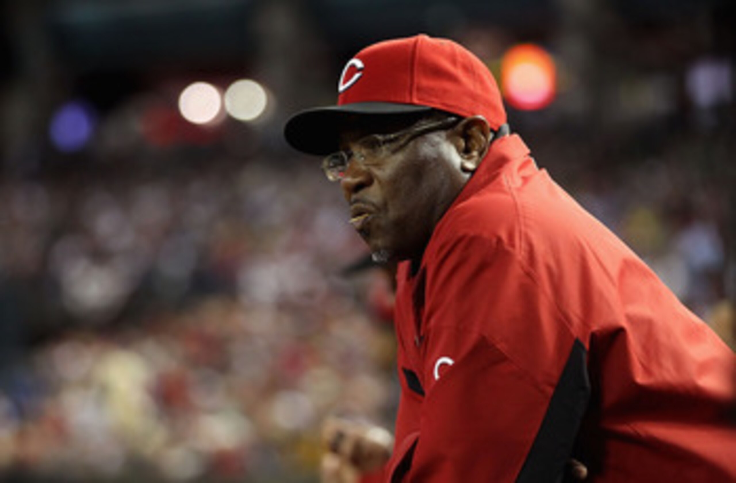 PHOENIX, AZ - APRIL 08: Manager Dusty Baker of the Cincinnati Reds watches from the dugout during the Major League Baseball home opening game against the Arizona Diamondbacks at Chase Field on April 8, 2011 in Phoenix, Arizona. (Photo by Christian Peter PHOENIX, AZ - APRIL 08: Manager Dusty Baker of the Cincinnati Reds watches from the dugout during the Major League Baseball home opening game against the Arizona Diamondbacks at Chase Field on April 8, 2011 in Phoenix, Arizona. (Photo by Christian Peter