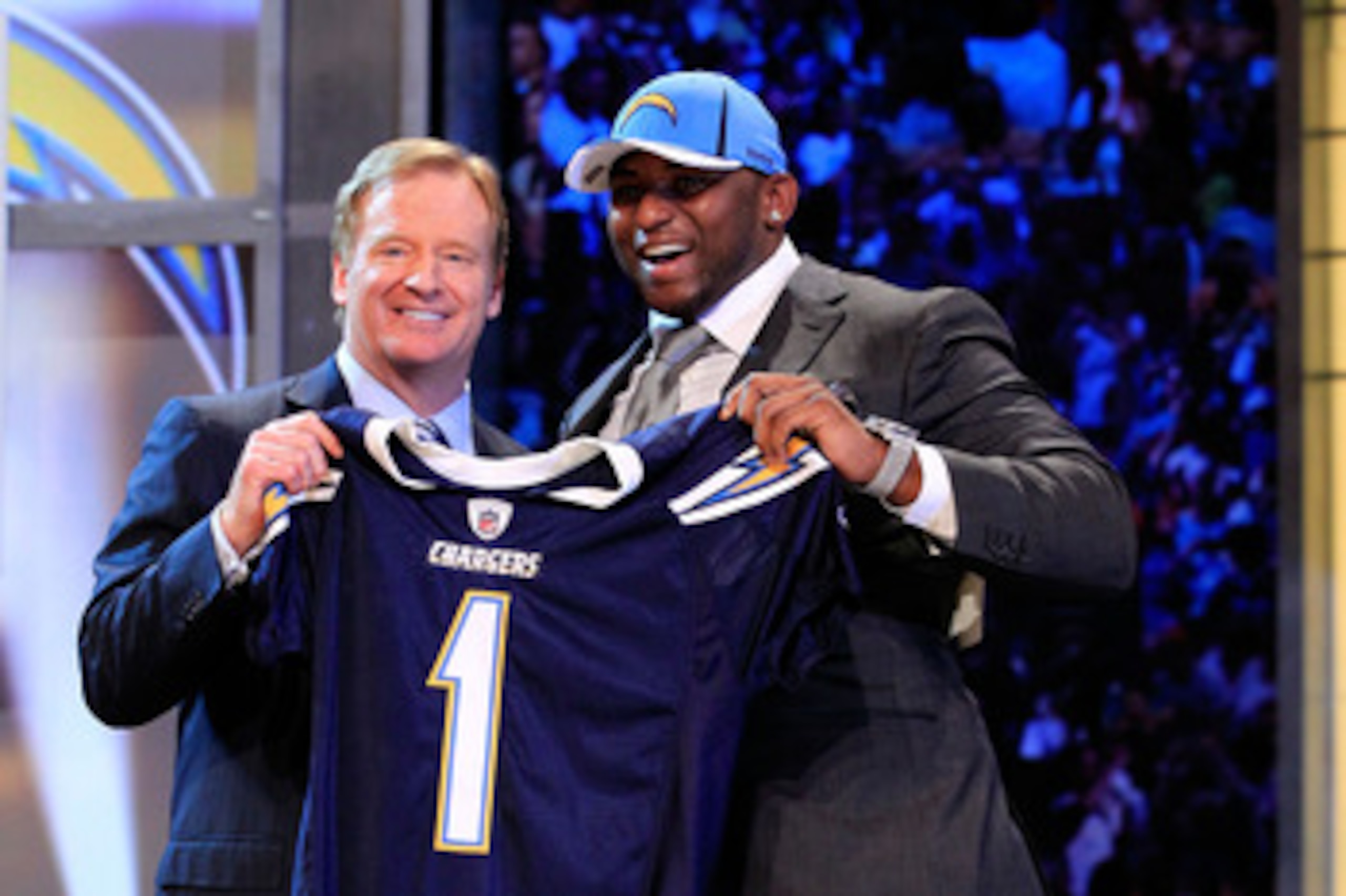 NEW YORK, NY - APRIL 28:  NFL Commissioner Roger Goodell (L) poses for a photo with Corey Liuget, #18 overall pick by the San Diego Chargers, on stage during the 2011 NFL Draft at Radio City Music Hall on April 28, 2011 in New York City.  (Photo by Chris 